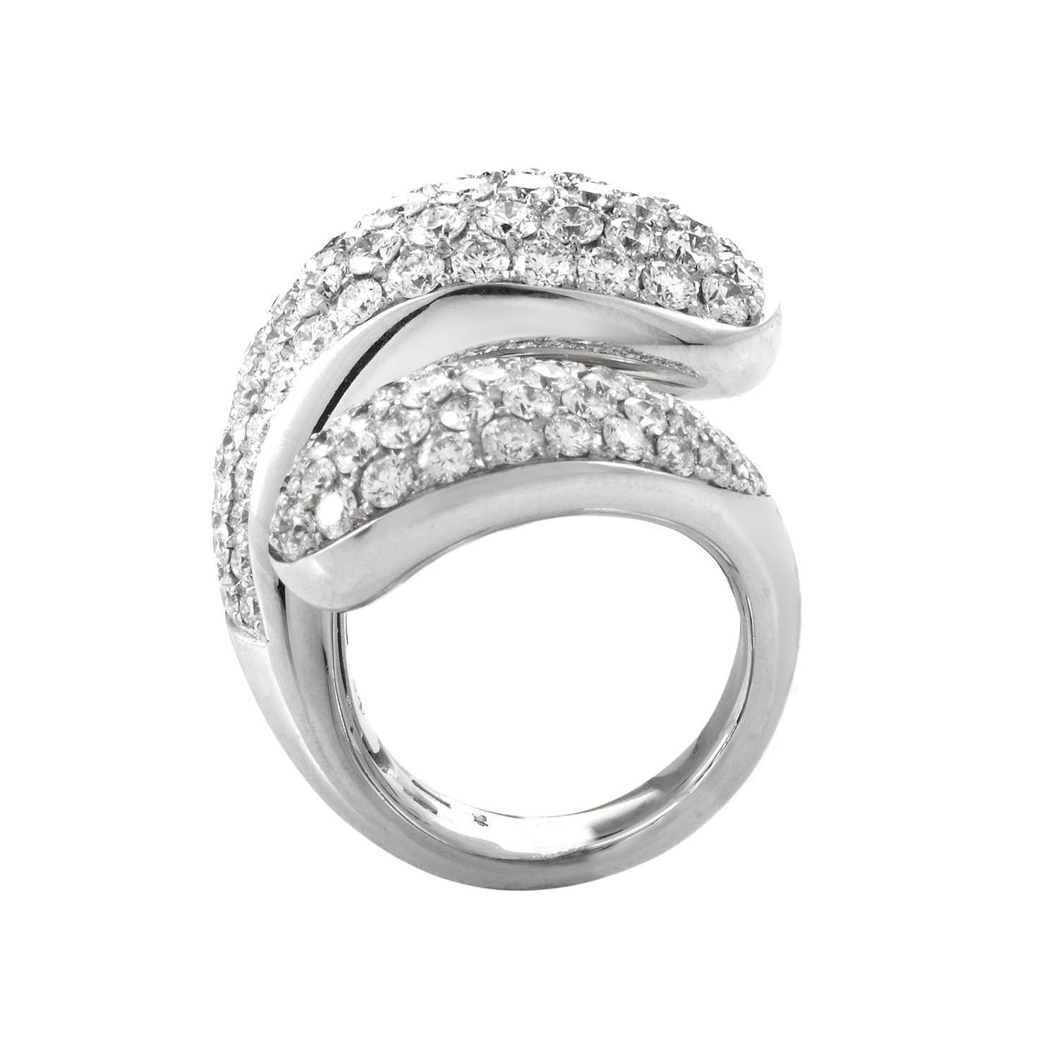 This ring from de Grisogono is lavish and lovely. It is made of 18K white gold and is set with and ~6ct diamond pave.
