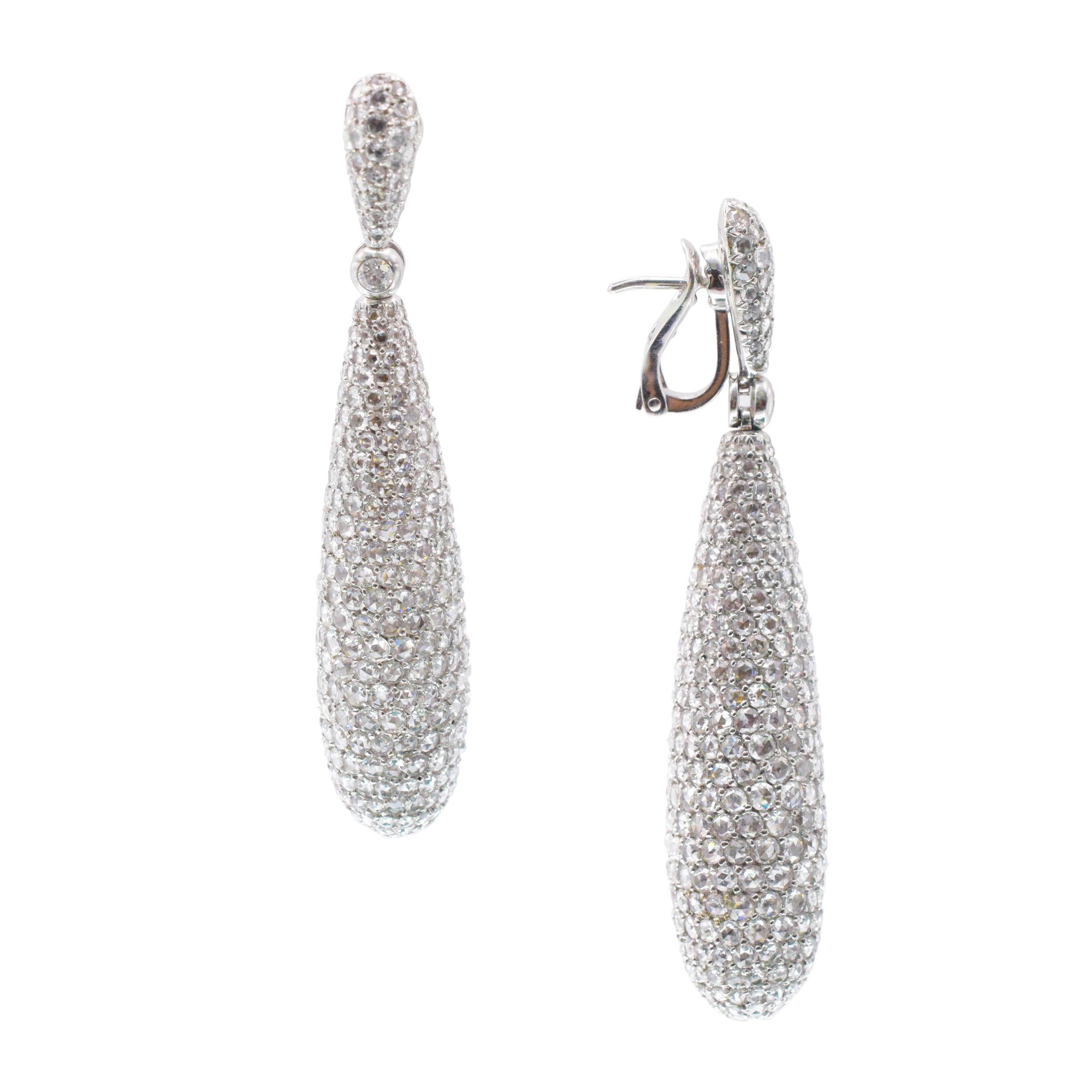 De Grisogono Diamond 'Gocce' earrings in 18k white
gold. The earrings feature drop design, encrusted in round rose cut diamonds with total weight of
approximately 20. carats, color F/G, clarity VS
Equipped with collapsible post and clip back