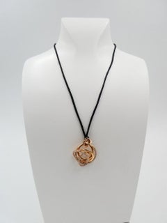 "De Grisogono" Diamond Pendant adjustable in 18K Pinkgold with black rope