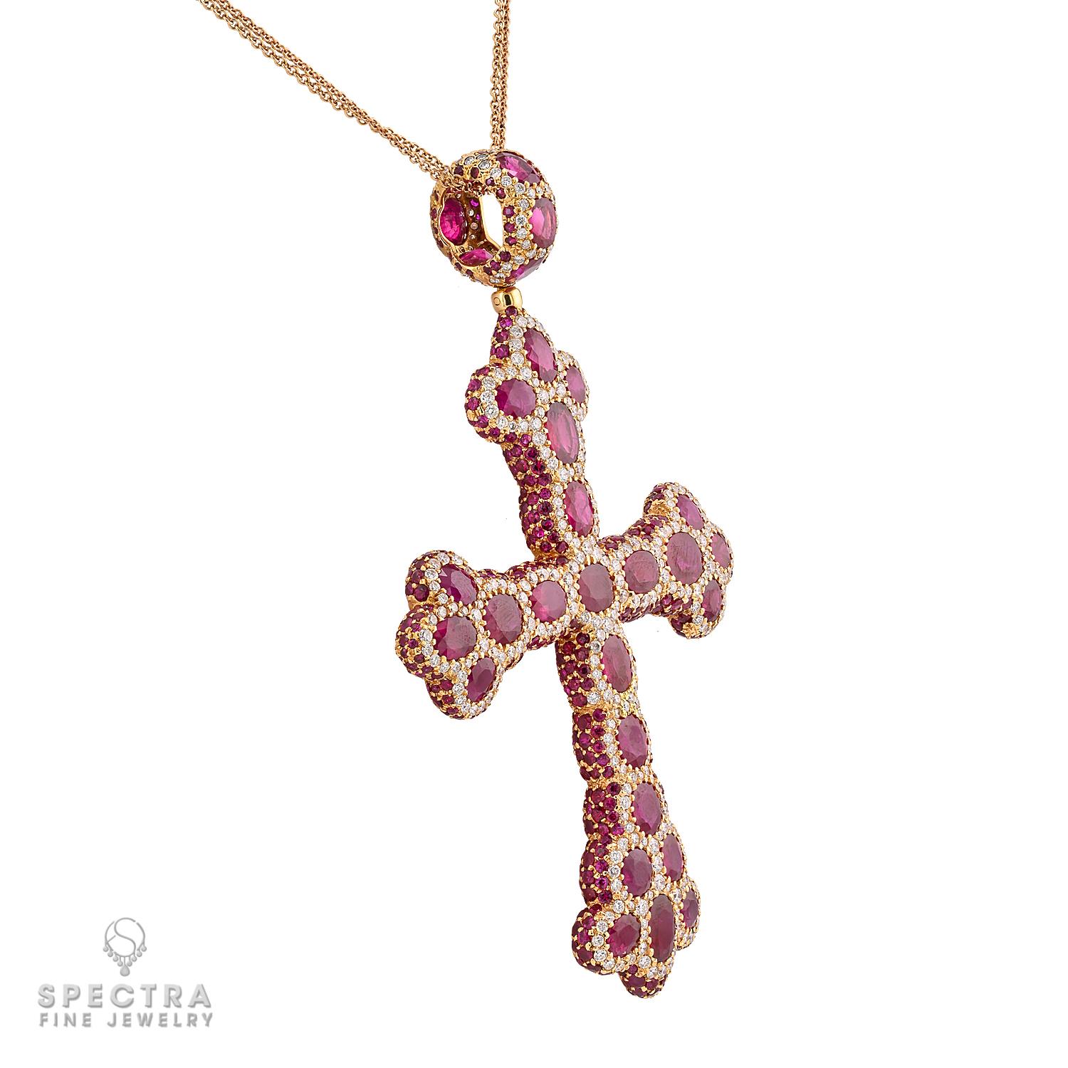 Bold and breathtaking, this exceptional De Grisogono Ruby and Diamond Cross Chain Necklace is a true masterpiece, presented by Spectra Fine Jewelry. Crafted in rich 18k yellow gold, the necklace features an impressive cross pendant adorned with a