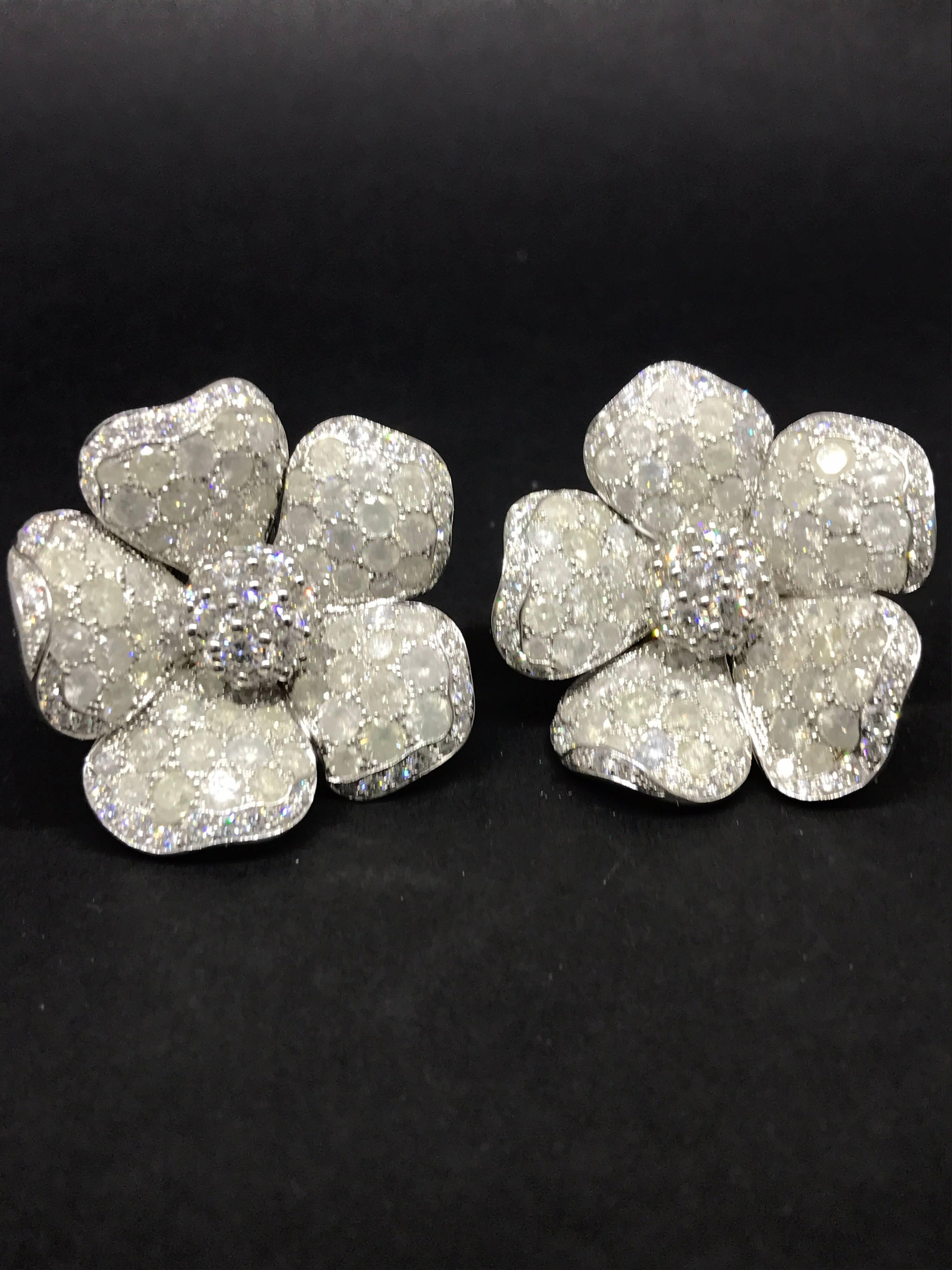 De Grisogono Large Flower Earrings

Model Number: 18202/02-003

100% Authentic

New / Old Stock

Earrings set with Icy White Diamonds (22.87 Carats) and white diamonds (7.87 Carats)

Can fasten as a butterfly or just clip-on