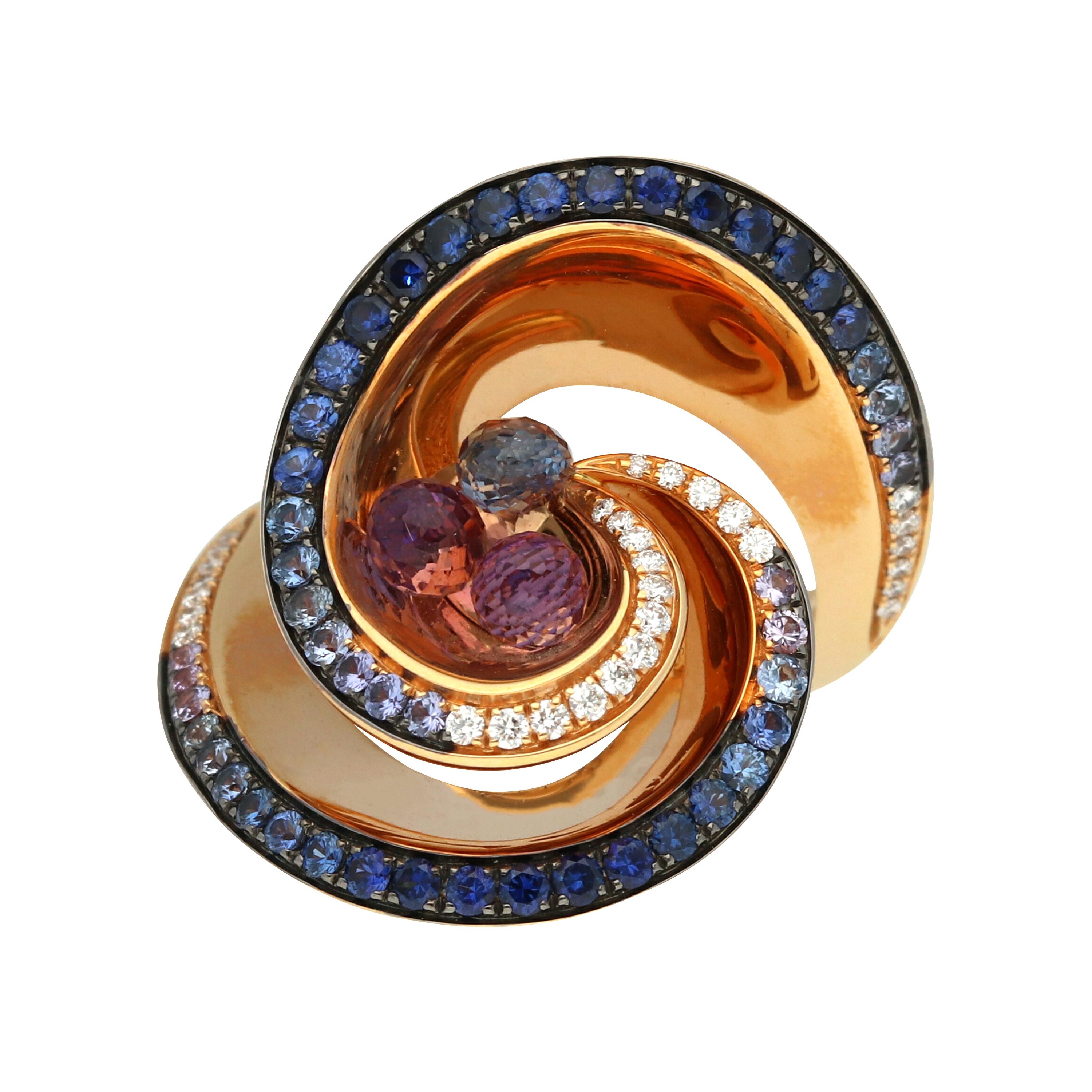 de GRISOGONO's 'Chiocciolina' ring from the 'Melody of Colours' collection, in Pink Gold set with white diamonds, sapphires, 2 amethyst drops and 1 blue sapphire briolettes. 

With Certificate of Authenticity. Number: B71181. Reference: