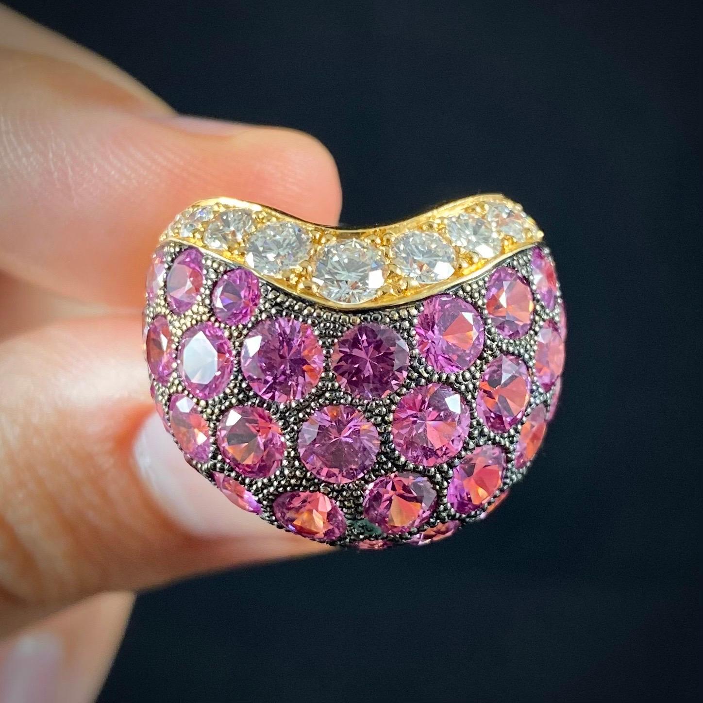 de GRISOGONO pink sapphire and diamond wishbone-shape bombe cocktail ring in 18kt yellow gold, circa 2000. Of a domed fishbone design, this ring is pave-set throughout with 42 circular-cut pink/purple sapphires of graduated sizes pave-set in