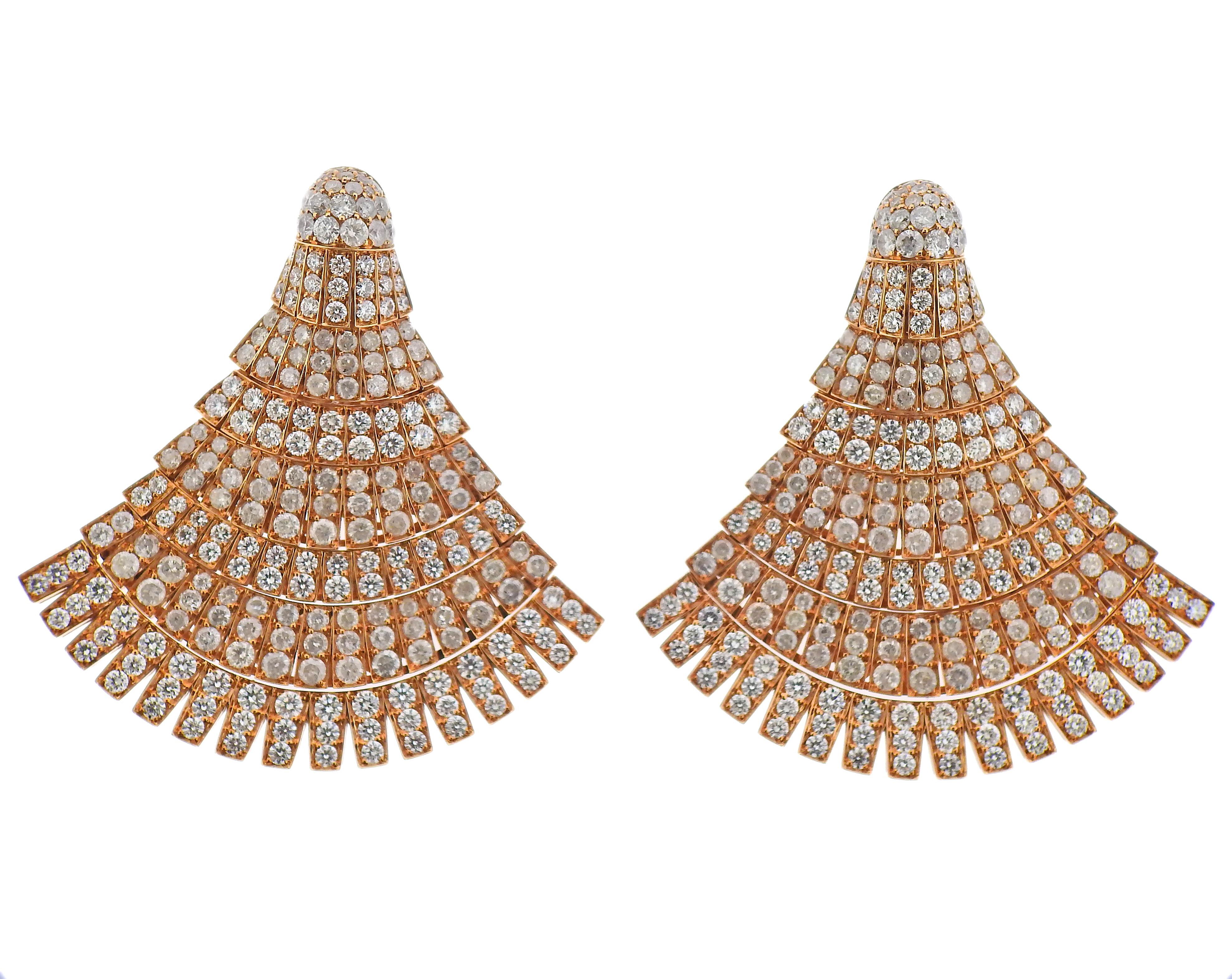Brand new 18k rose gold earrings by De Grisogono. Set with a total of 8.65ctw VVS F/G diamonds and 9.65ctw icy diamonds. Earrings measure 56mm long x 54mm at widest point. Marked - de Grisogono, Au750, serial number. Weight - 45.7 grams. Earrings