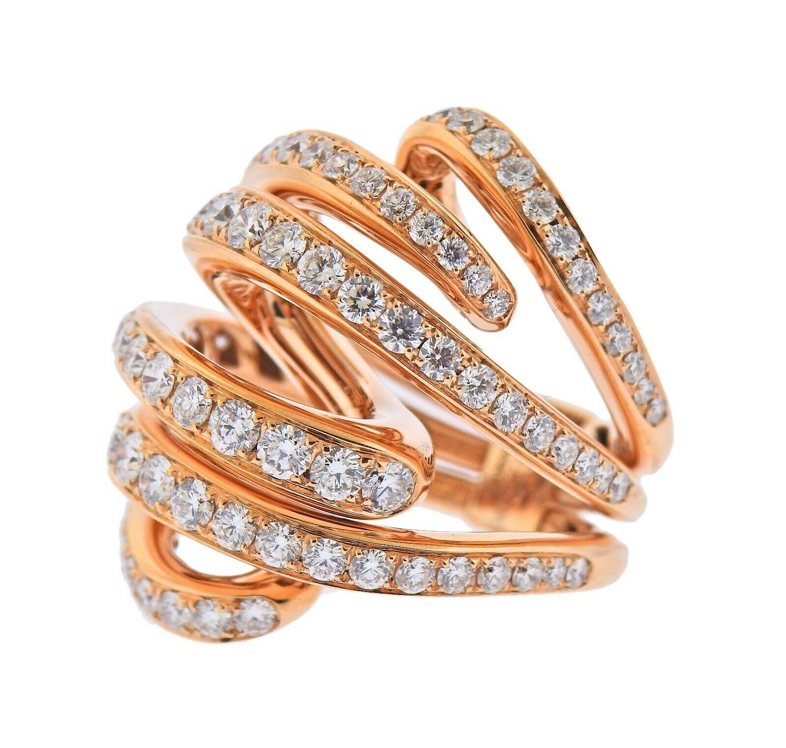 Brand new 18k rose gold Ring by De Grisogono. Set with 4.45ctw of VS/G Diamonds. Ring sizes -7.5 (55) ring top - 33mm wide. Marked - de Grisogono, Au750, B87177. Weight 29.5 grams. Ring comes with COA, booklet and box. Retail $29700
