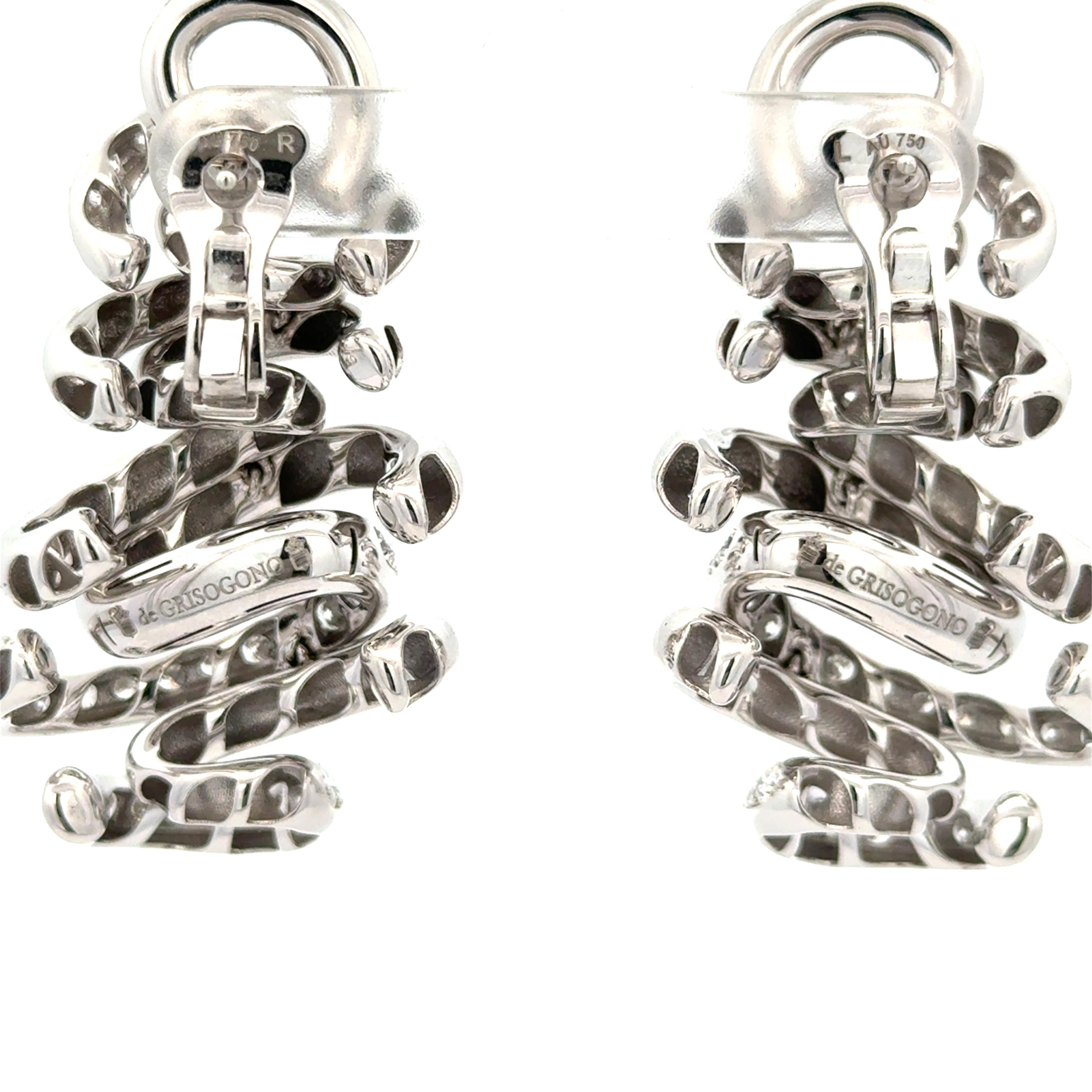 De Grisogono Vortice Diamond Earrings in 18K White Gold. The earrings feature 4.65ctw of brilliant round diamonds. Normal retail on these earrings is $30,000. The earrings approximately measure 2