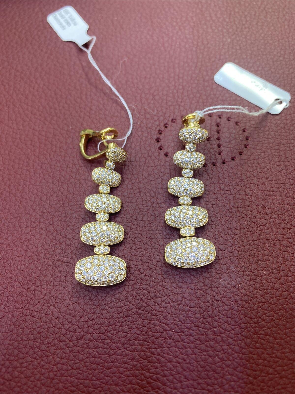 de GRISOGONO Boucles d'oreilles en or jaune et diamants blancs.

