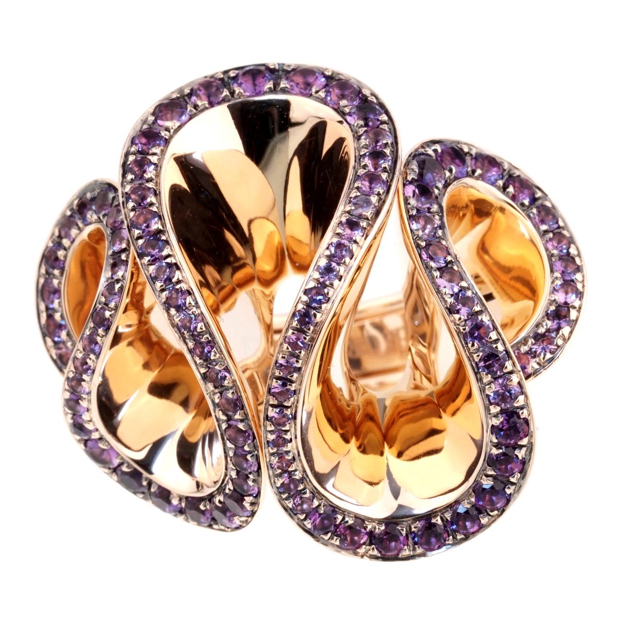A magnificent De Grisogono Zigana ring featuring amethyst stones set in 18k rose gold.

Size: 6 1/4 Resizeable