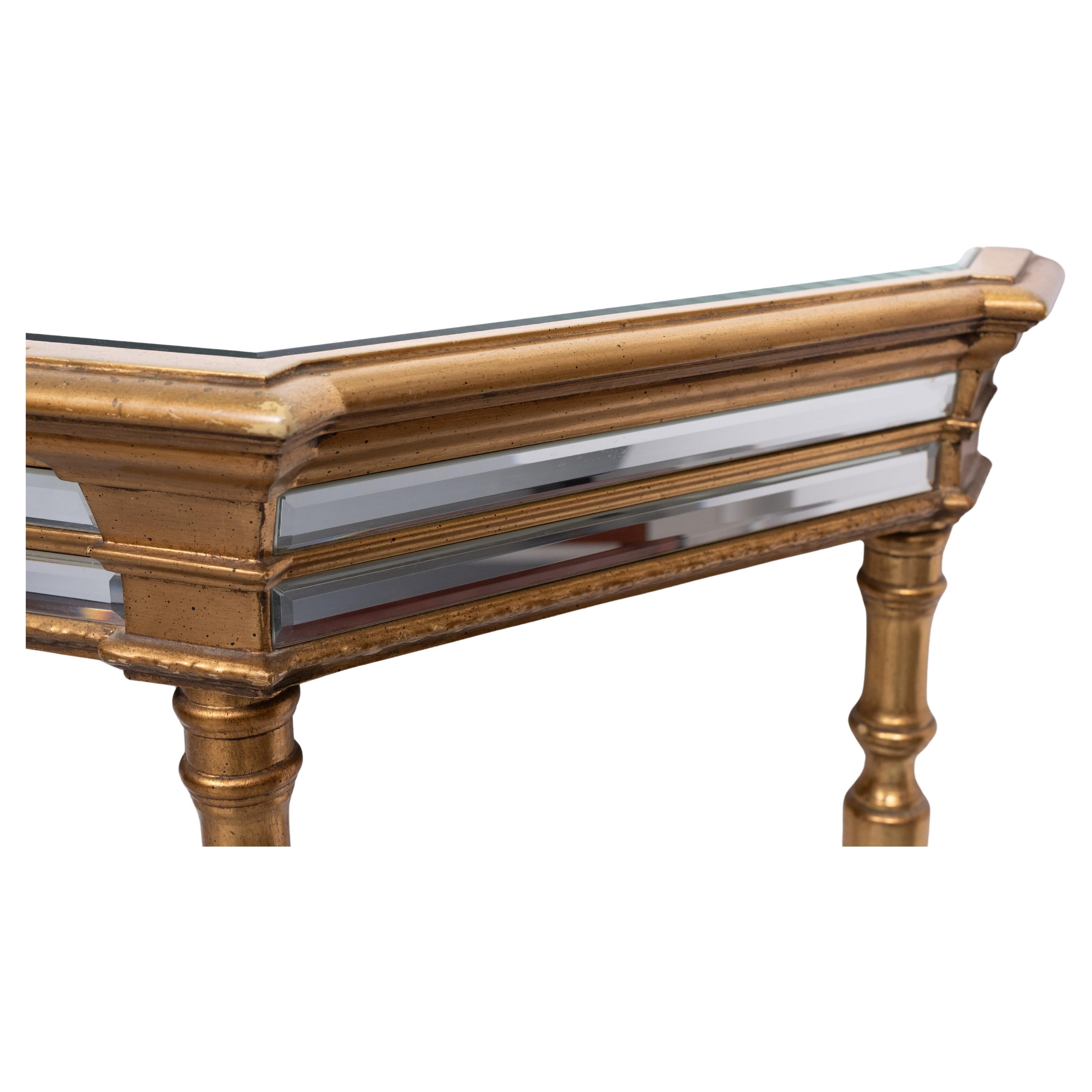 Superb Console Table . Gilded Wood ,comes with beveled Mirror 
top and front . Hollywood Regency style . Good condition . 
Manufactured by De Knudt Belgium 1970s 