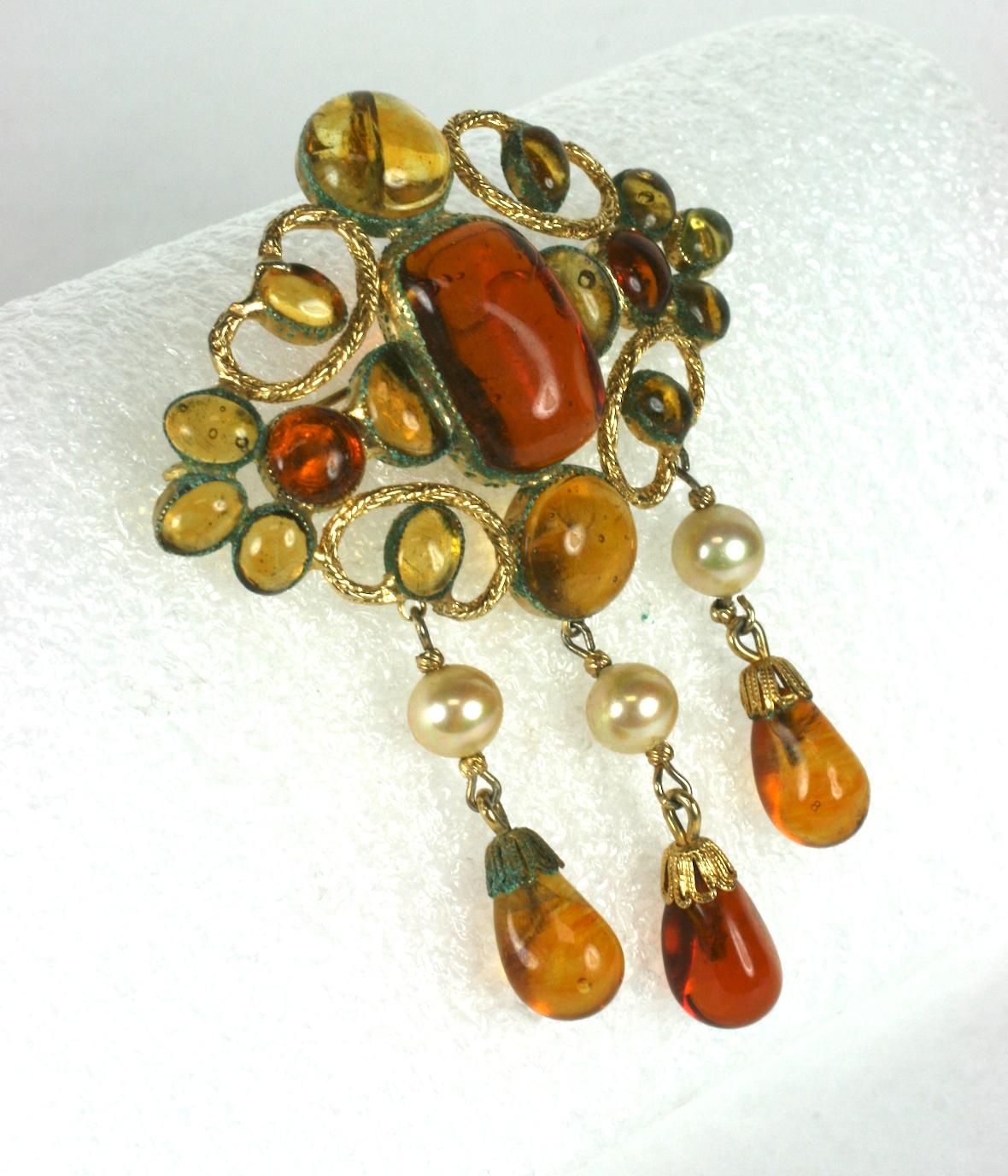 Elaborate De Nicola Citrine and Topaz made by Gripoix, Paris brooch of 2 tones of citrine poured glass with faux pearls and dangling drops. Many manufacturers contracted pieces from the Gripoix, Paris factory as they could not produce the hand made