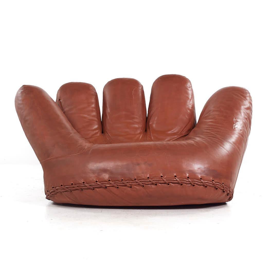 De Pas Durbino & Lomazzi for Poltronova Mid Century Leather Joe Baseball Glove Chair-1970s

This chair measures: 65 wide x 44 deep x 33.5 high, with a seat height of 16.5 inches

All pieces of furniture can be had in what we call restored vintage