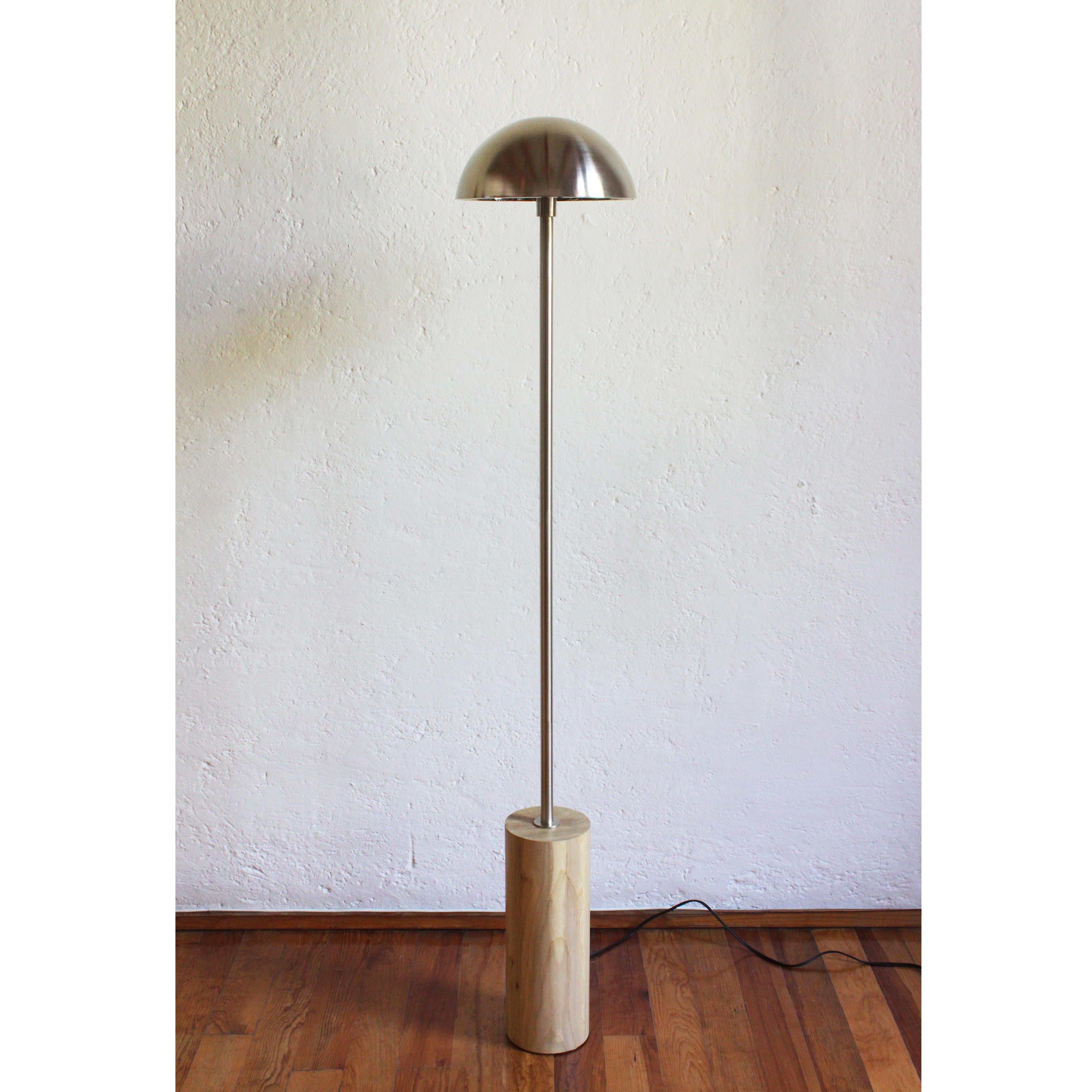 DE PIE ABAJO is a dimmable floor lamp with dimmer in cable. The solid steel structure is covered in electrostatic metal finish. The base of this lamp is designed with internal steel counterweight. Matte finish.

Measures: Dome H 15cm x W 30cm x D