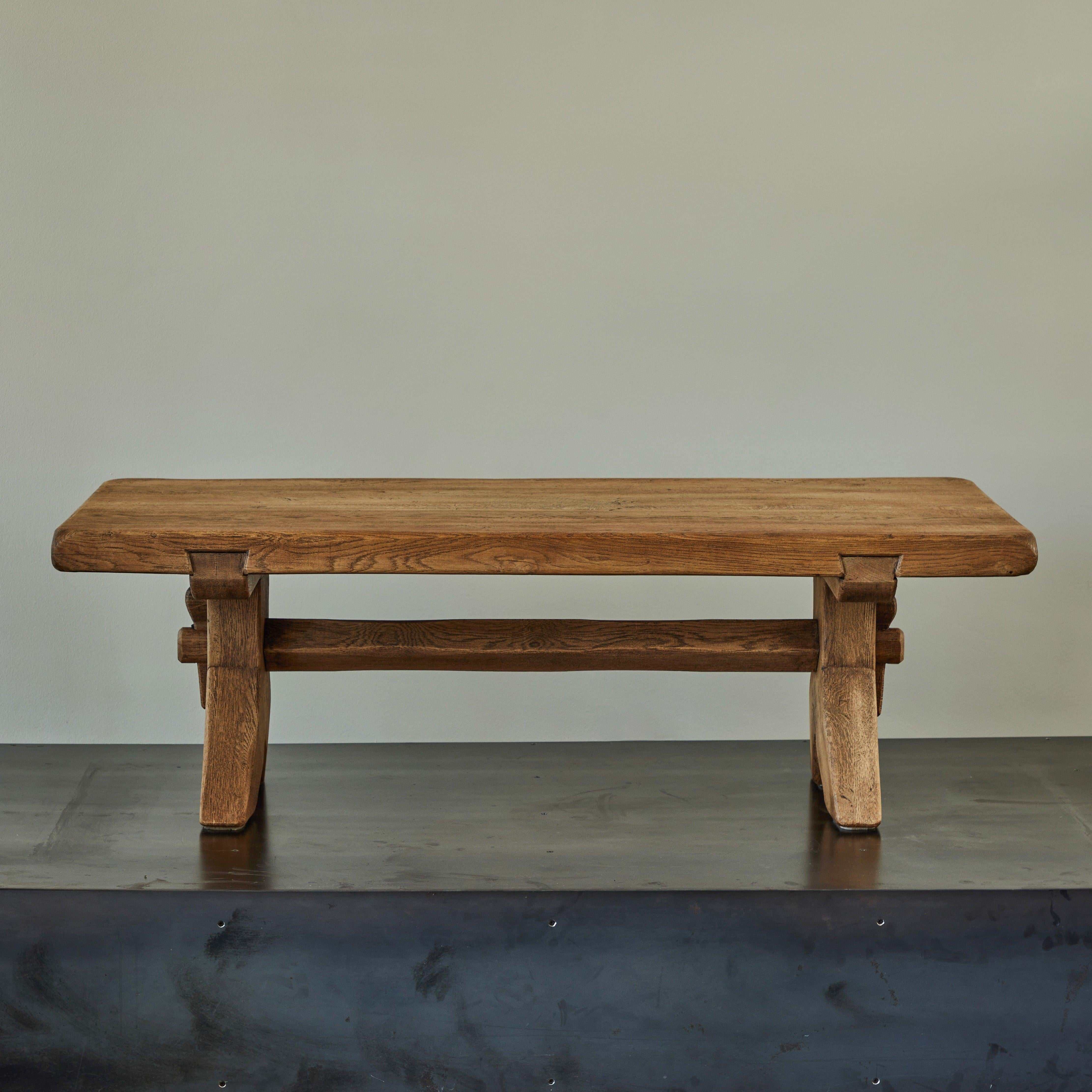 Solid oak coffee table designed by De Puydt. Lovely 'dry' construction with pegged joints, chocked tenons and dovetail cleats. The scale of timber is incredible, giving this Belgian midcentury table a chunky rustic feel.

Belgium, circa