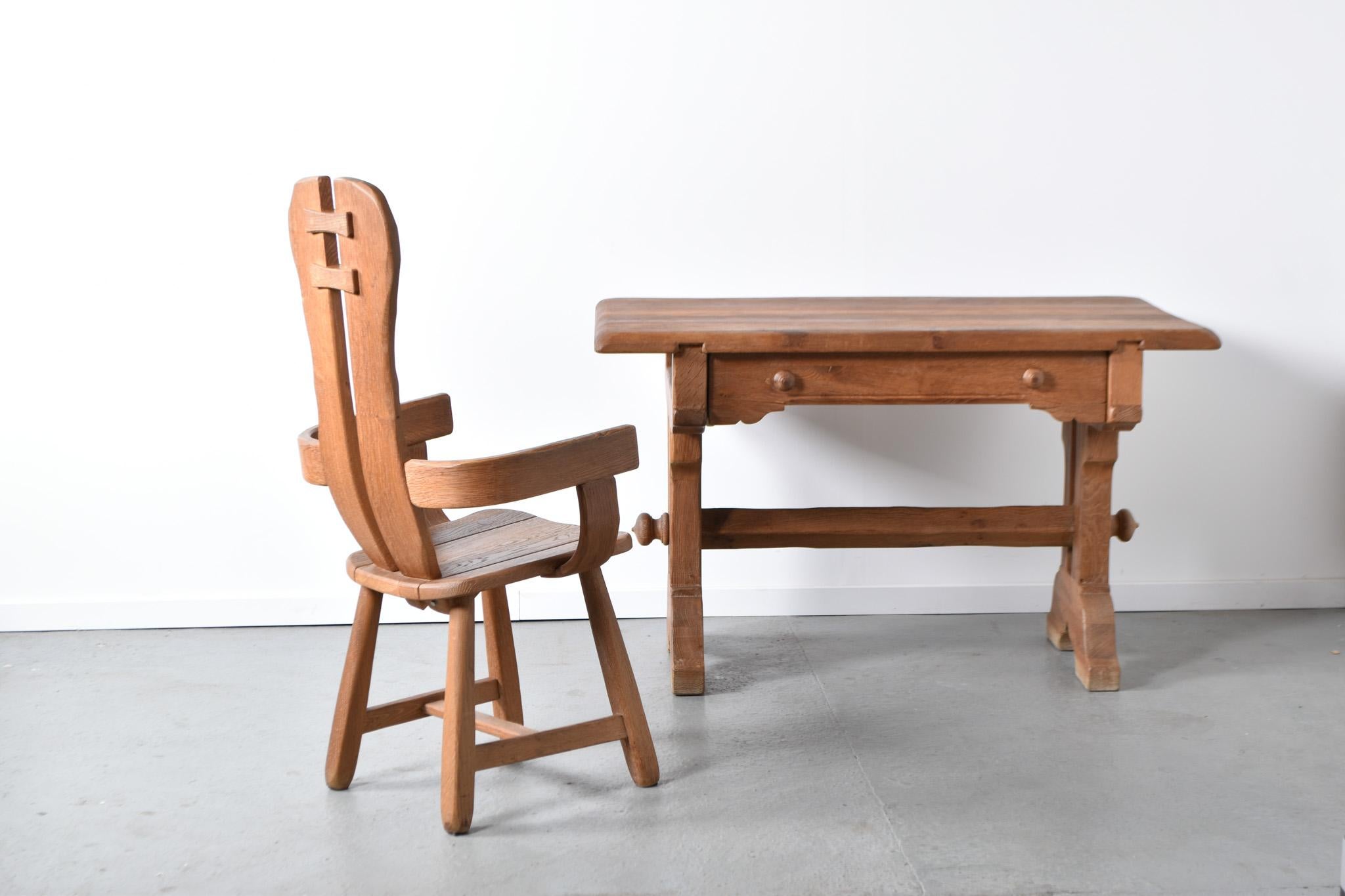  De Puydt Brutalist Oak Desk and Armchair: Iconic Belgian Craftsmanship from the 1970s

De Puydt Brutalist Oak Desk and Armchair, a remarkable testament to Belgian artistry hailing from the bold era of the 1970s. This ensemble embodies the raw