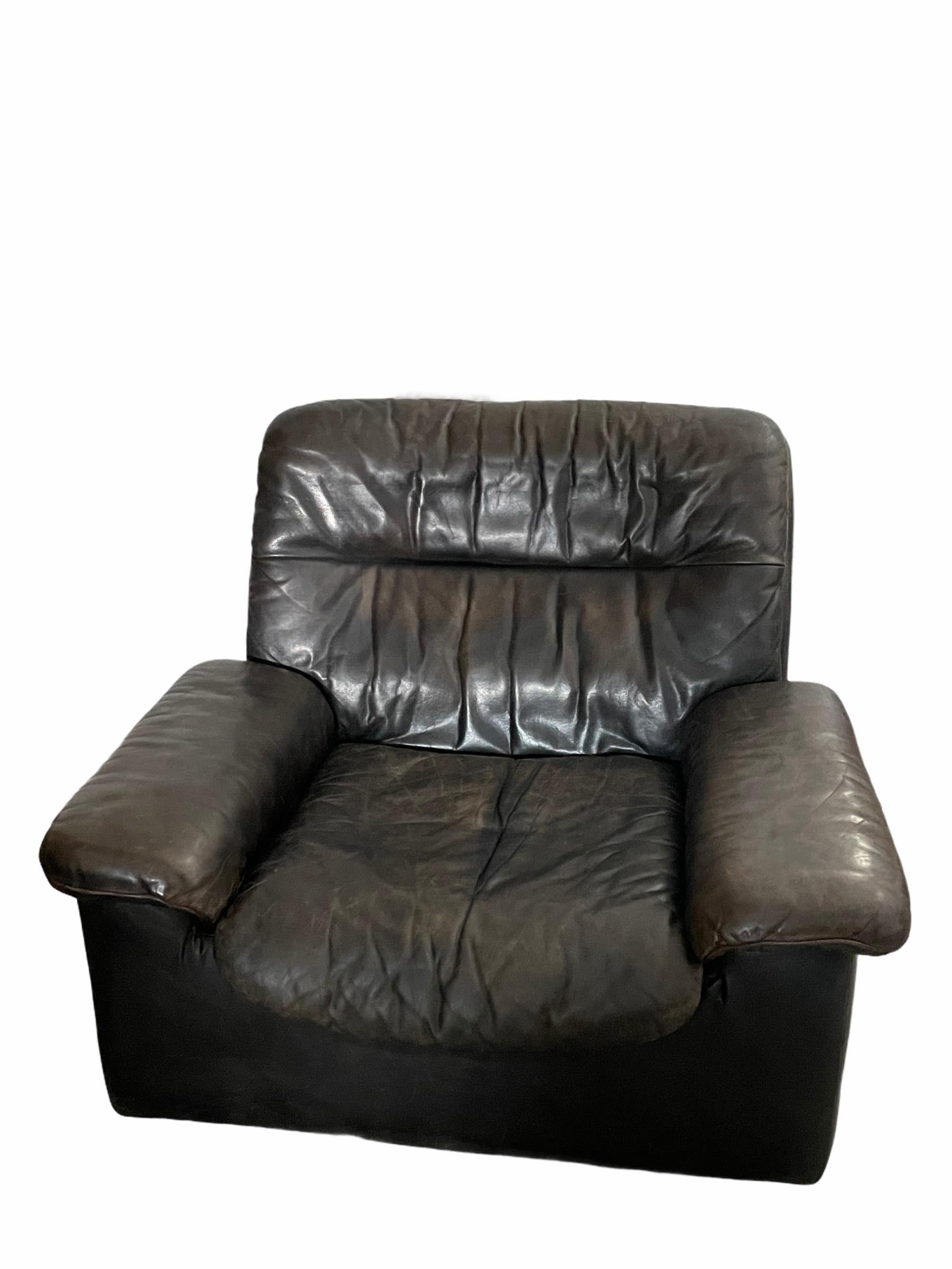 DeSede reclining armchair. Original from the 1970s. 

It was manufactured by the the Swiss company De Sede which is renowned worldwide for its high quality of handmade leather work. 

It is in made with the high end stitching work De Sede is