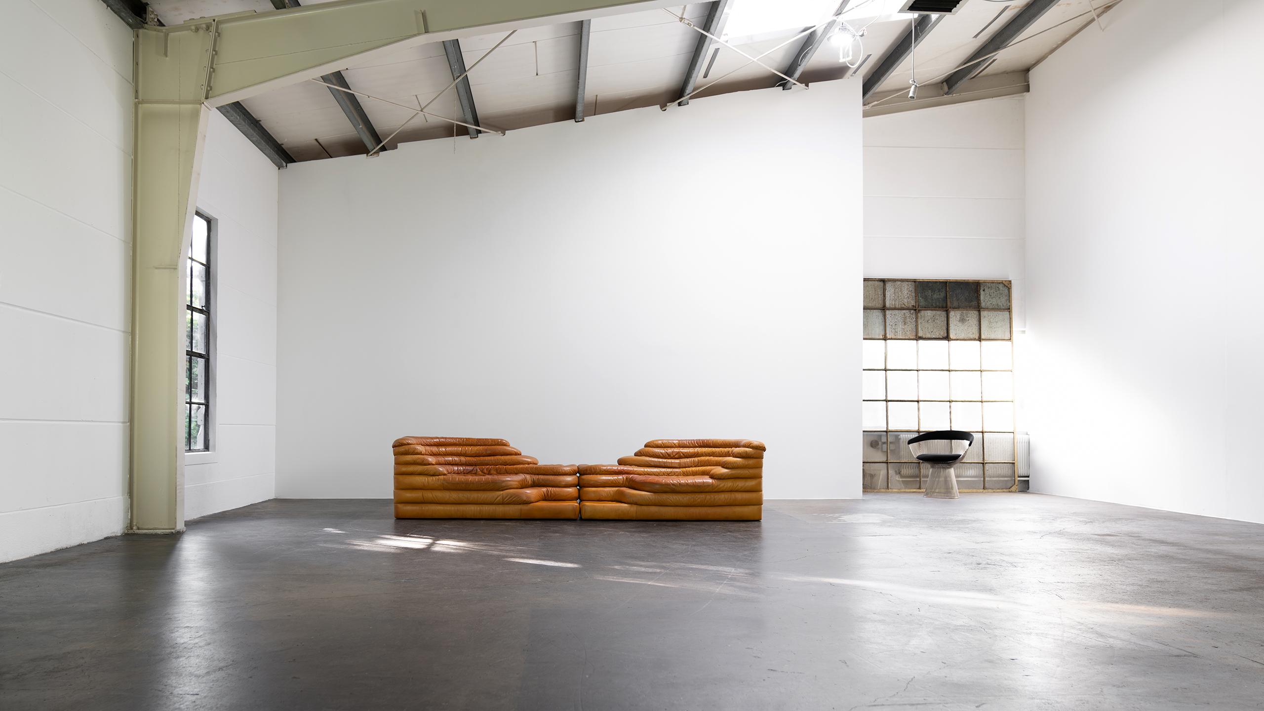2x De Sede Terrazza sofas, model DS 1025 in cognac leather.
Designed in 1972 by Ubald Klug & Ueli Berger for De Sede, Switzerland.

Sophisticated design sofa elements form the perfect basis for implementing your own interior design and furnishing