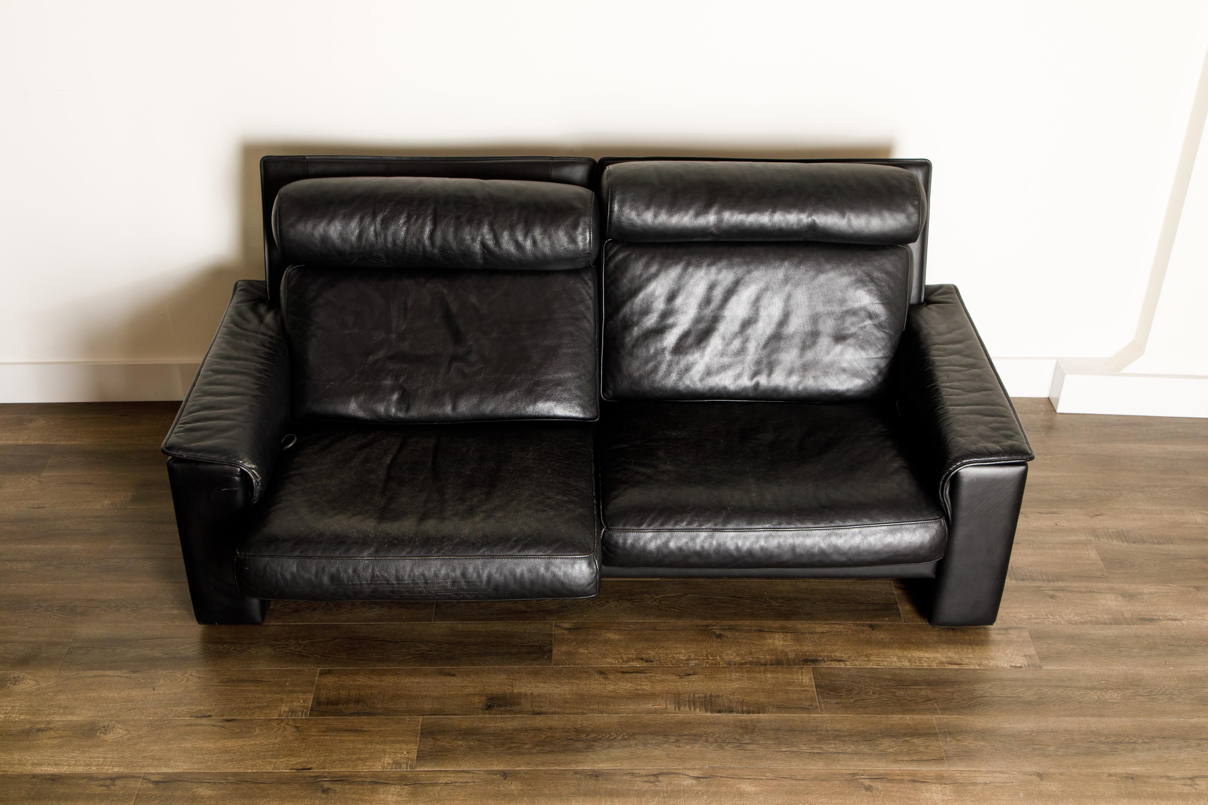 De Sede Aged Black Leather Recliner Loveseat Sofa, 1970s Switzerland, Signed In Good Condition In Los Angeles, CA