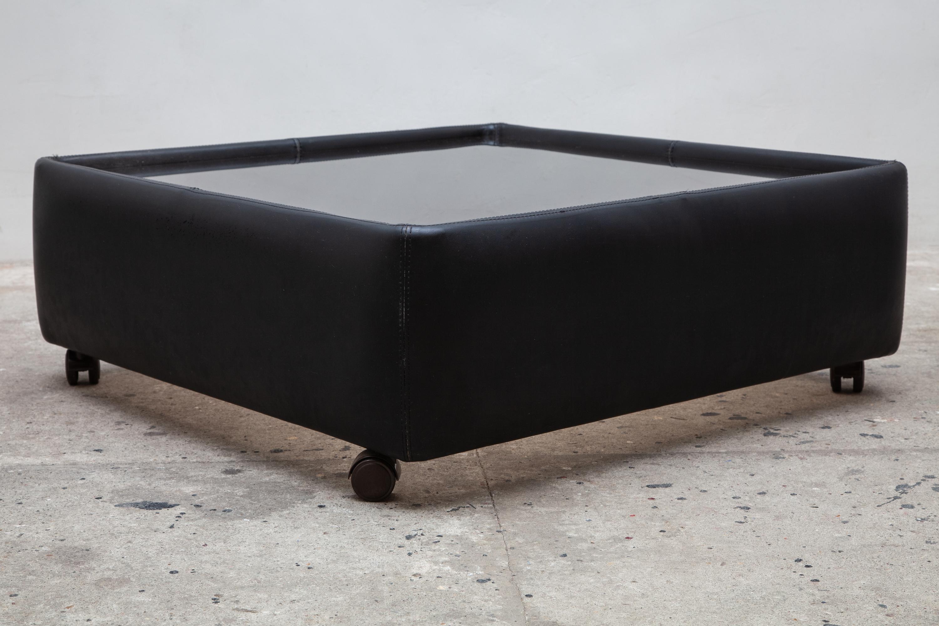 leather coffee table with glass top