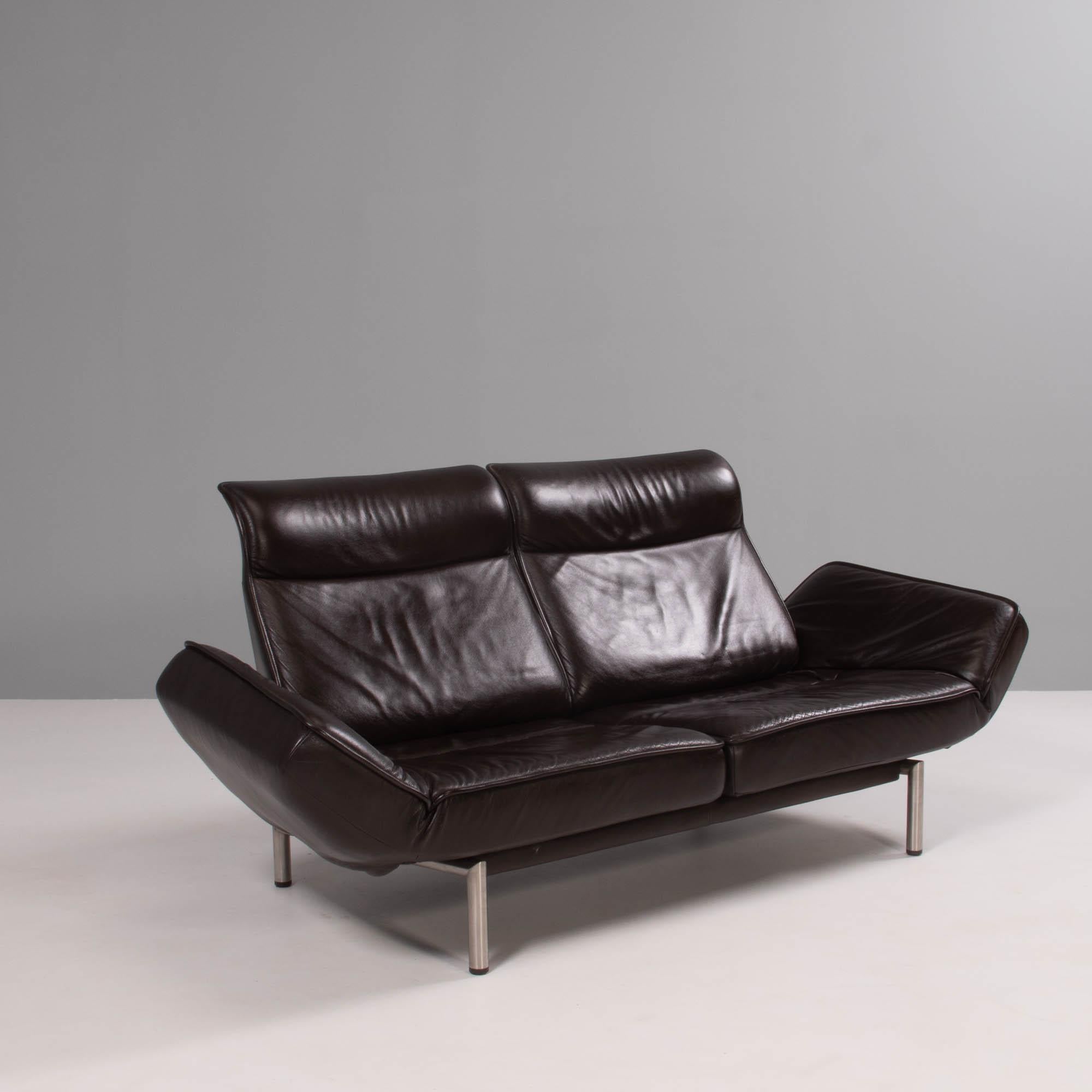 Originally designed by Reto Figg in 1985 the DS-450 has since been updated by Thomas Althaus. 

Constructed with chrome base and upholstered in dark brown leather, the sofa can be adapted into a variety of different seating arrangements.

The