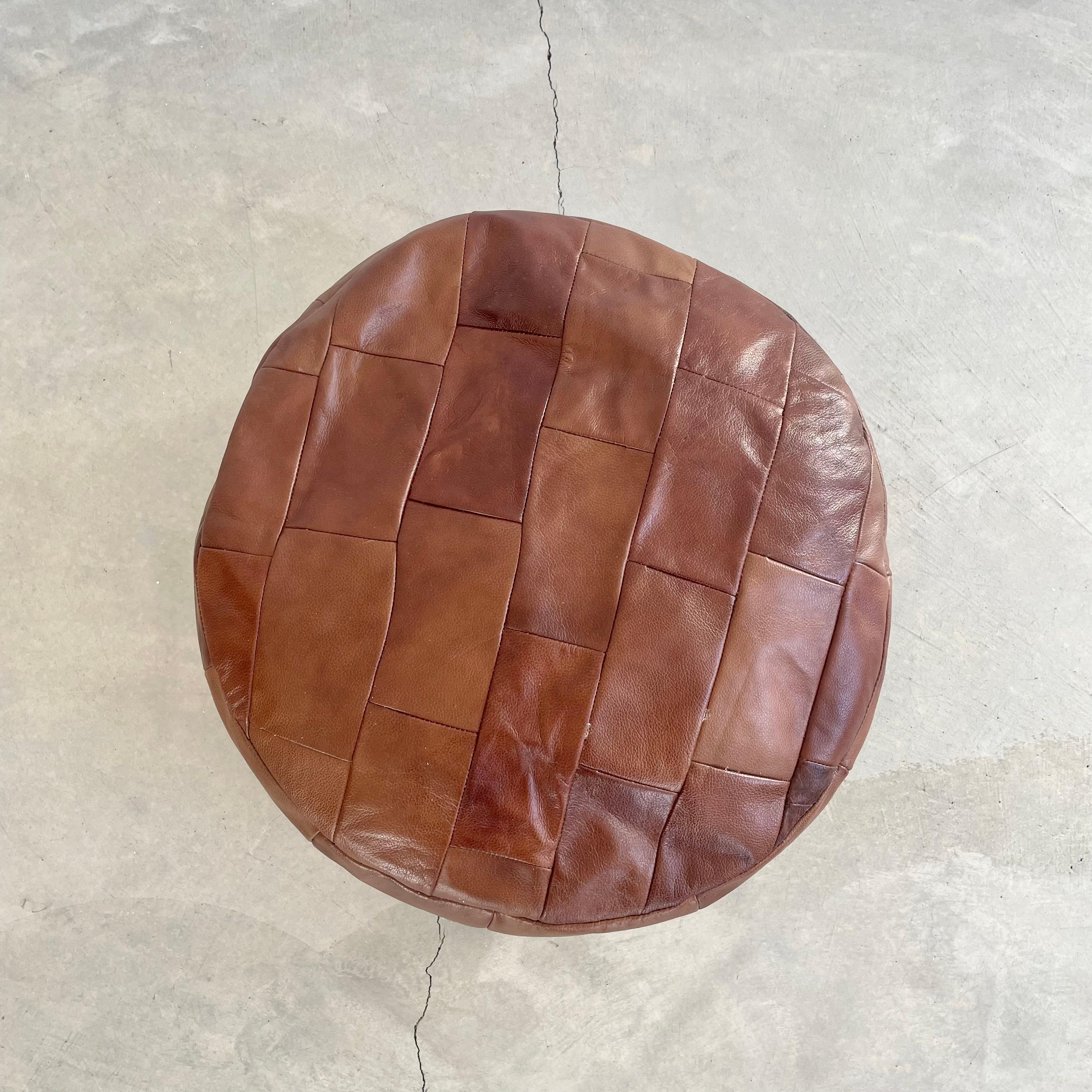 round cognac leather ottoman