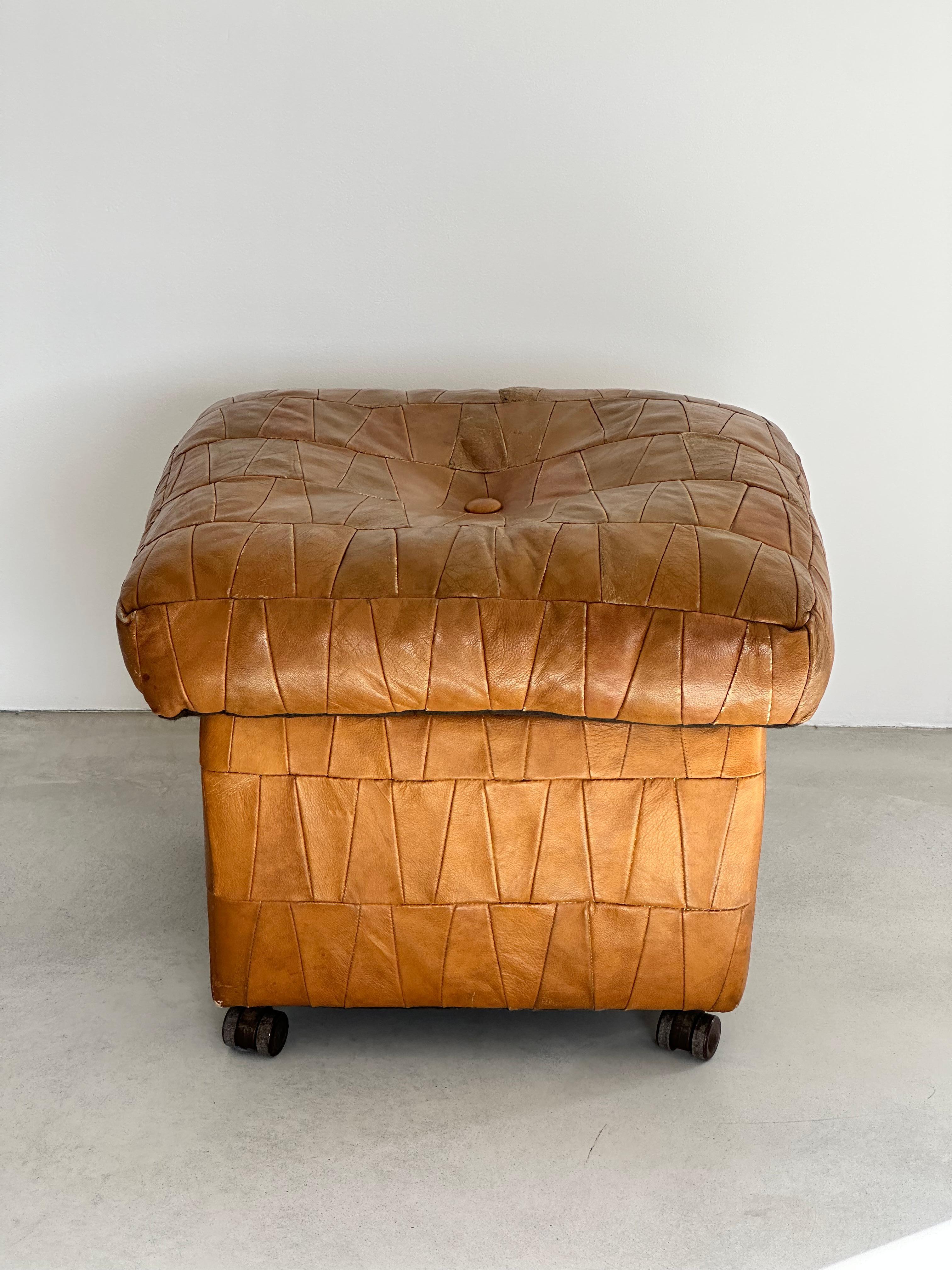 Camel patchwork leather storage ottomans with open top by Swiss designer De Sede. 

Original soft leather with beautiful patina.

Good condition.

1970s.

Many colors and sizes available, check out my other items.
de Sede has its origins in a small