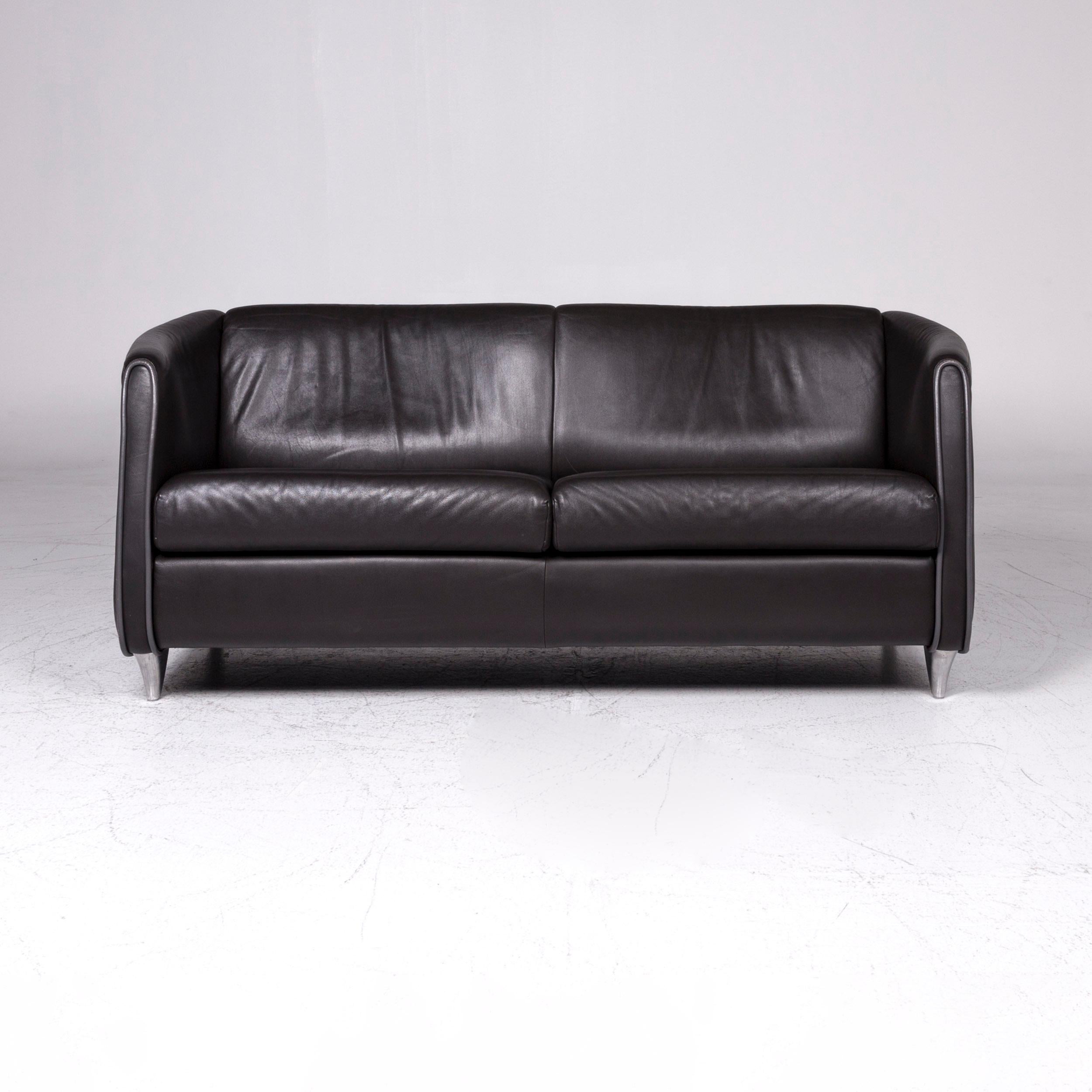 We bring to you a De Sede designer leather sofa black two-seat couch.
 
Product measurements in centimetres:
 
Depth 80
Width 176
Height 76
Seat-height 46
Rest-height 74
Seat-depth 51
Seat-width 146
Back-height 37.
 