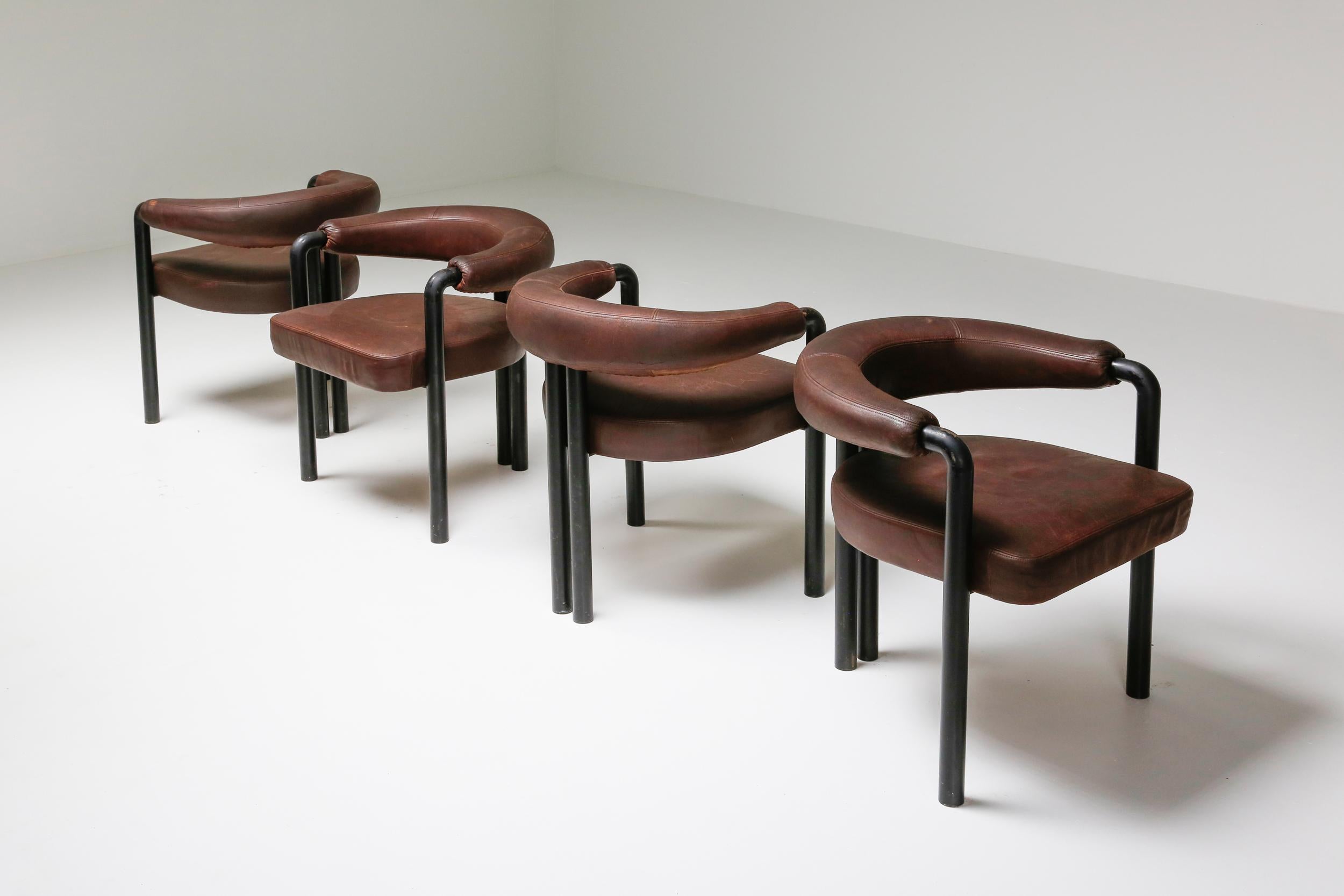 Mid-Century Modern armchairs, De Sede, Switzerland, 1960s, brown leather, black steel

Modernist inspired armchairs, simple in design and outstanding in comfort.
Similar to this chair are the Italian designed chairs 'Pigreco' by Scarpa and
