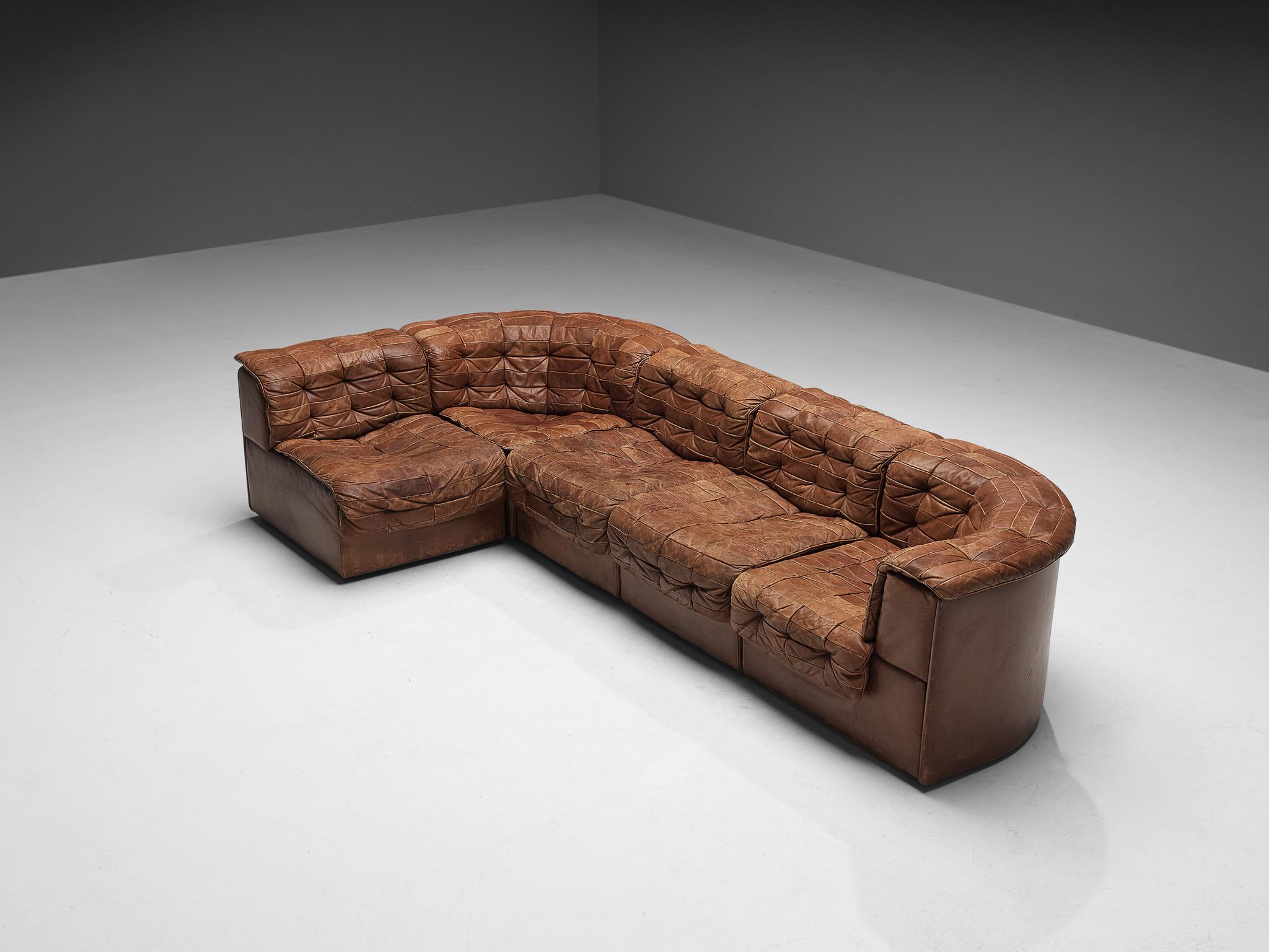 De Sede, 'DS-11' sectional sofa, leather, Switzerland, 1970s.

This high-quality sectional sofa designed by De Sede in the 1970s contains three regular elements, two corner elements, making it possible to arrange this sofa to your own wishes. This