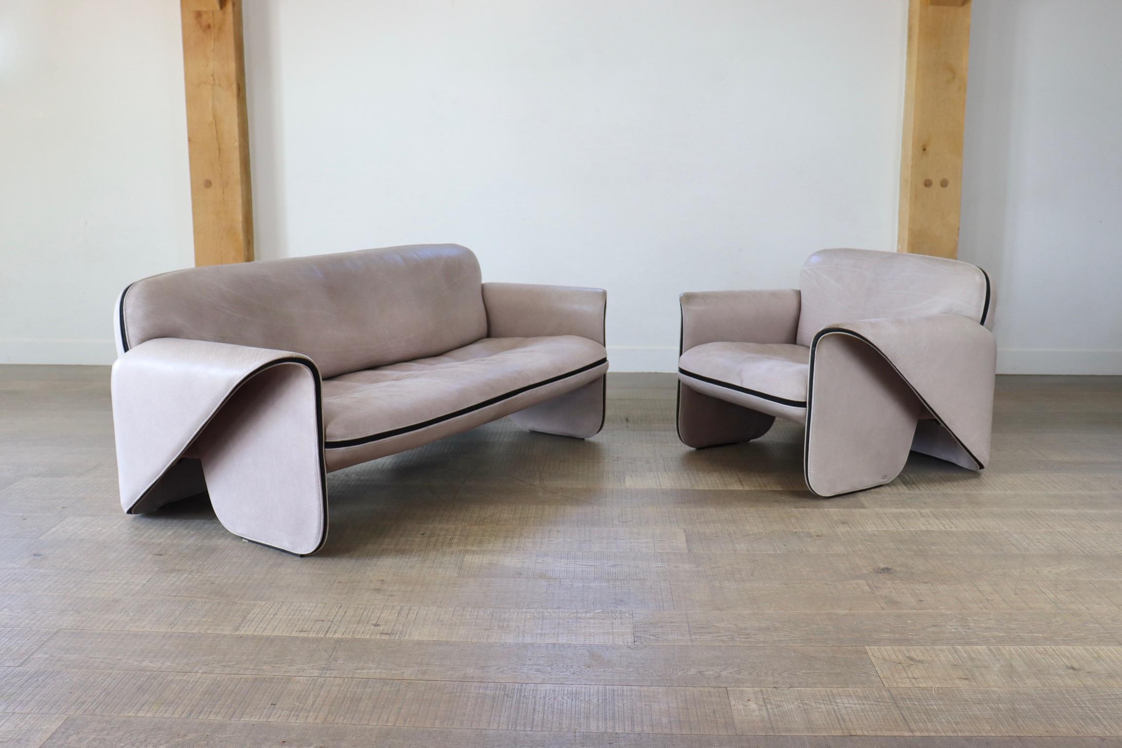 Rare three seat sofa and lounge chair by De Sede, designed by Gerd Lange in the 80s. De Sede is known for its use of only the highest quality leather. This set is upholstered in thick elephant grey buffalo leather. 

Dimensions: 
Sofa: W175 x D80