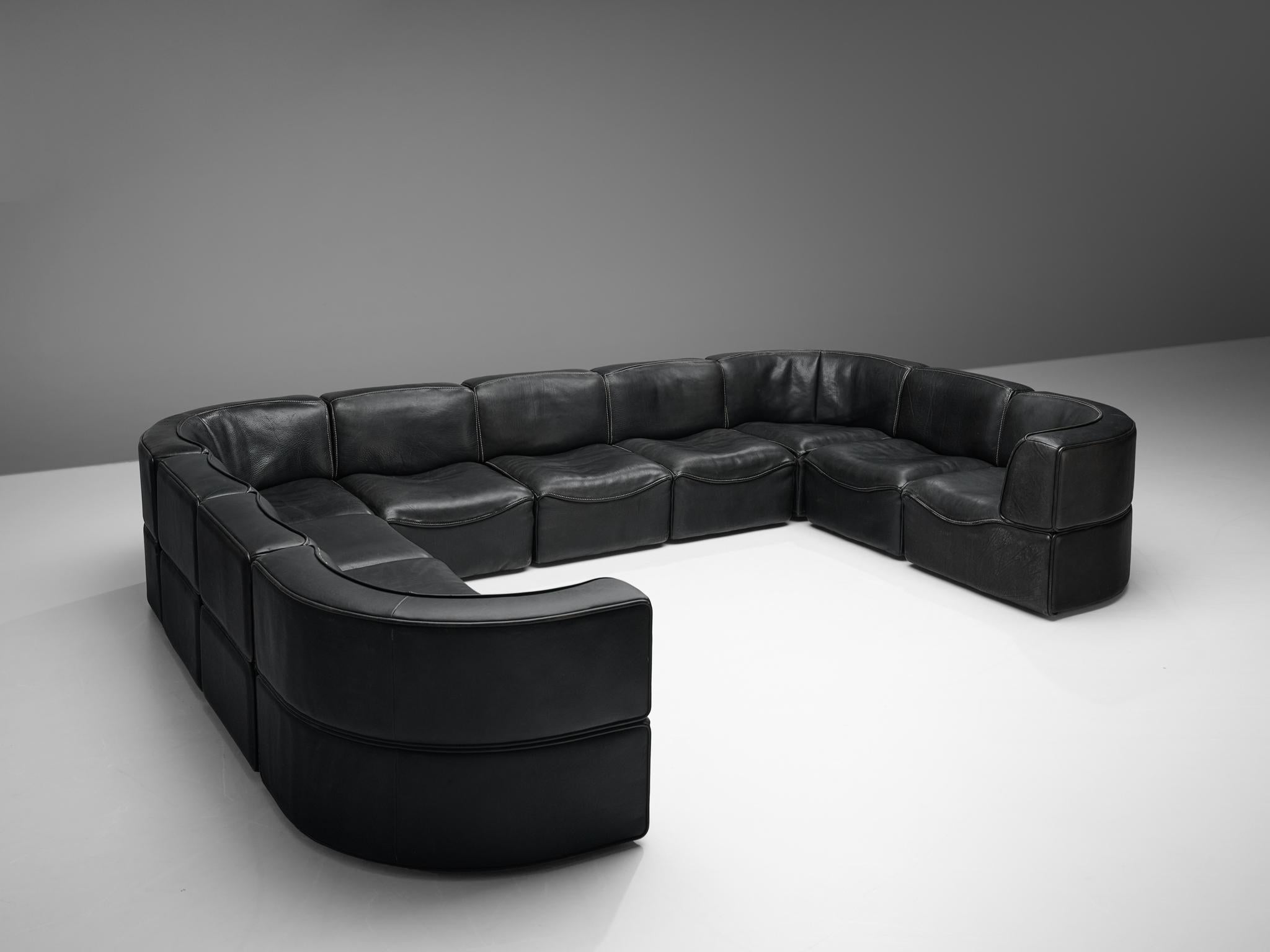 De Sede, sectional sofa model DS-15, black leather, Switzerland, 1980s. 

This high quality sectional sofa contains four corner elements and six normal elements, which makes it possible to arrange this sofa to your own wishes. The design is