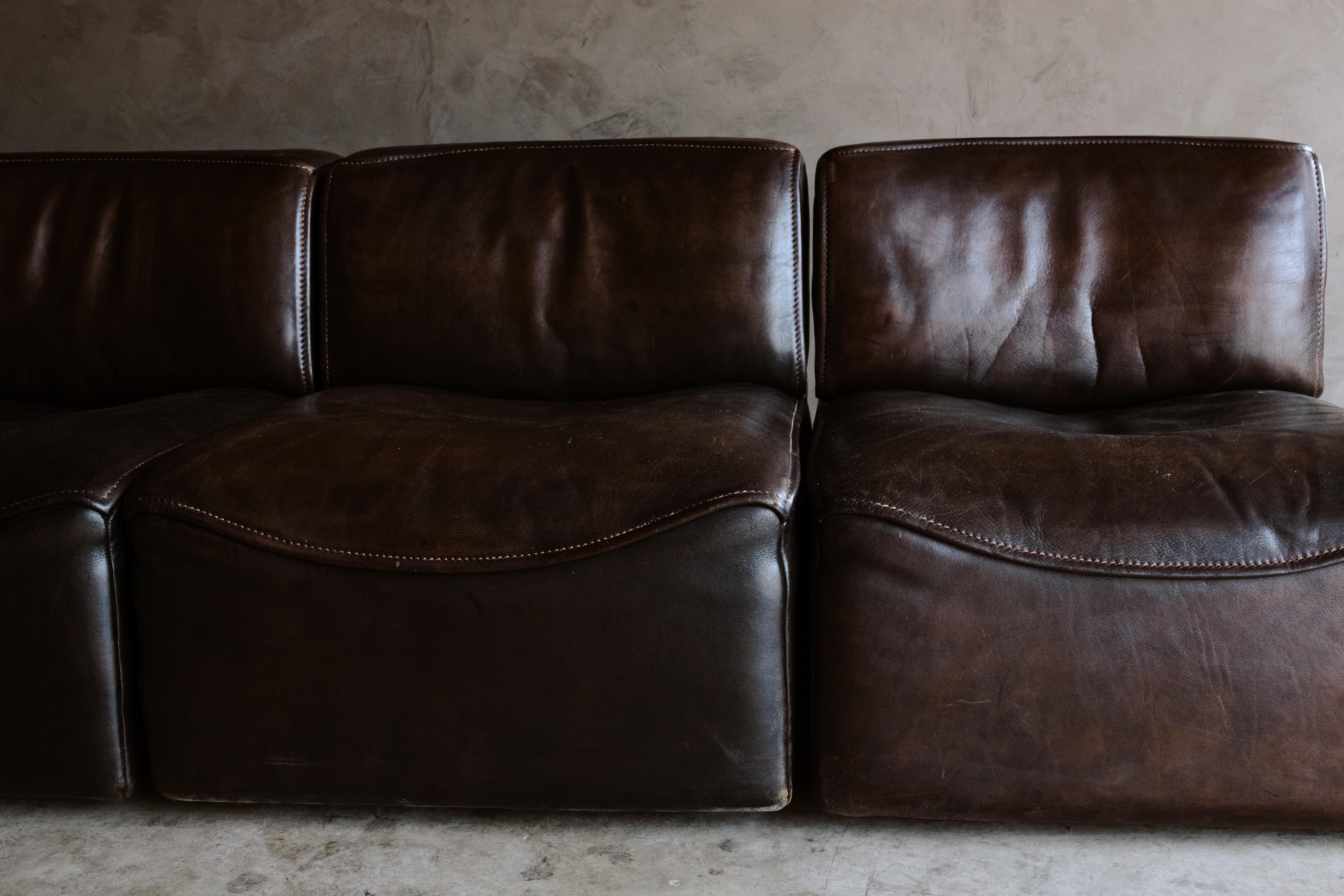 De Sede 'Ds-15' Modular Sofa in Buffalo Leather From Switzerland, 1970s. Four modular pieces in very dark brown / black color leather with fantastic patina and wear. Supreme quality and comfort. Each element is 25