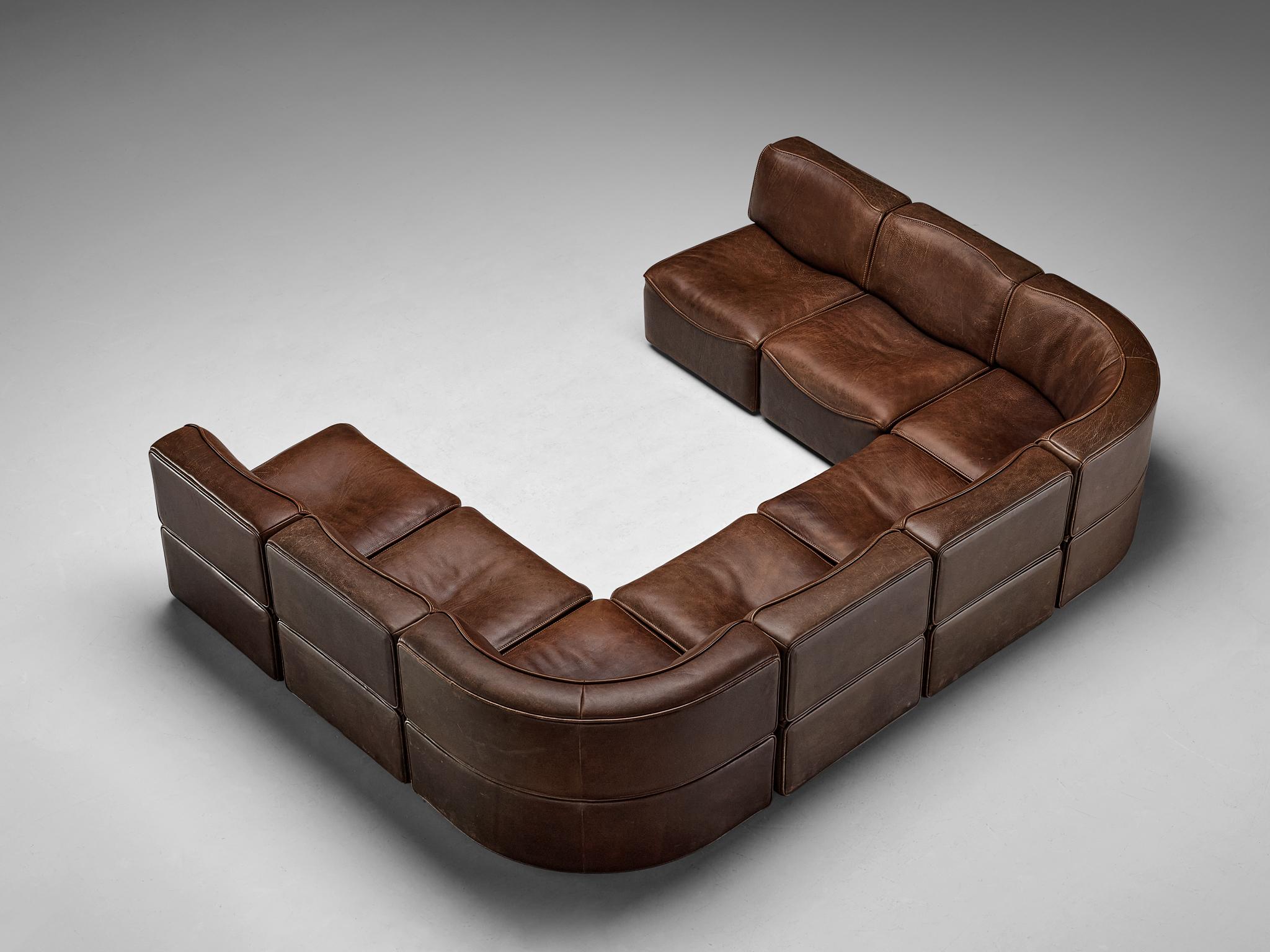 De Sede, 'DS-15' sectional sofa, patinated leather, Switzerland, 1970s.

This high-quality sectional sofa designed by De Sede in the 1970s contains six regular elements and two corner elements, making it possible to arrange this sofa to your own