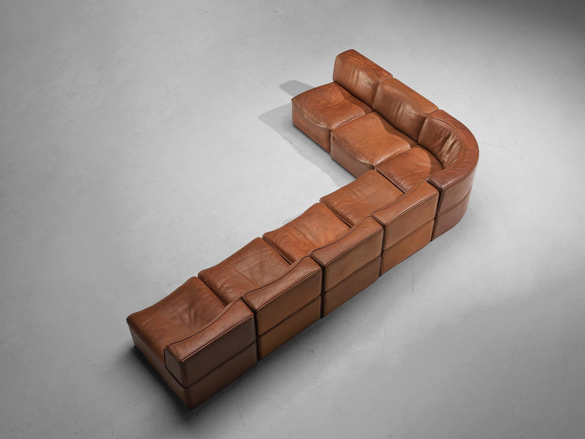 De Sede, 'DS-15' sectional sofa, patinated leather, Switzerland, 1970s.

This high-quality sectional sofa designed by De Sede in the 1970s contains six regular elements and one corner elements, making it possible to arrange this sofa to your own