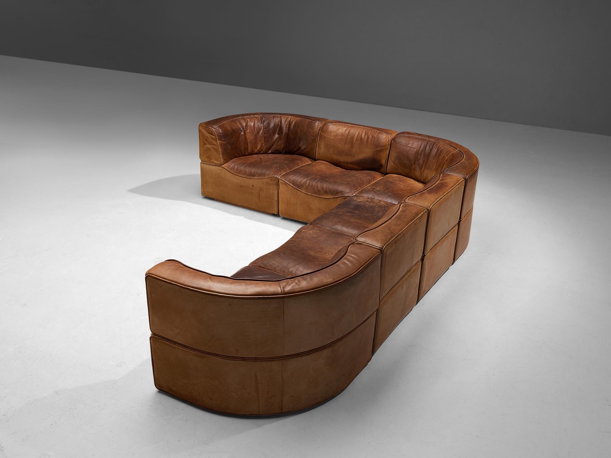 De Sede, 'DS-15' modular sofa, patinated leather, Switzerland, 1970s.

This high-quality sectional sofa designed by De Sede in the 1970s contains three regular elements and three corner elements, making it possible to arrange this sofa to your own