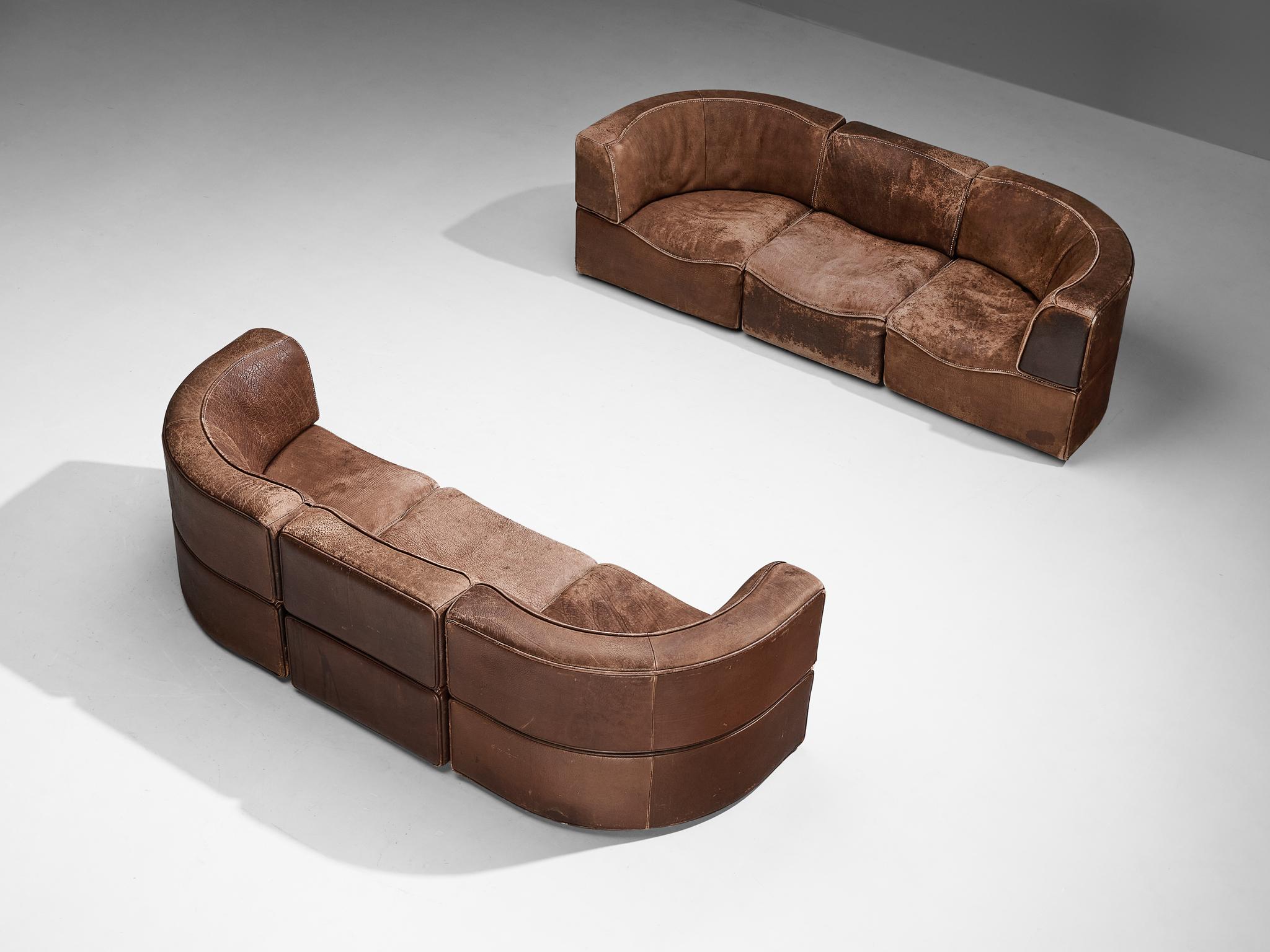 De Sede, 'DS-15' modular sofa, patinated leather, Switzerland, 1970s.

This high-quality sectional sofa designed by De Sede in the 1970s contains three regular elements and three corner elements, making it possible to arrange this sofa to your own