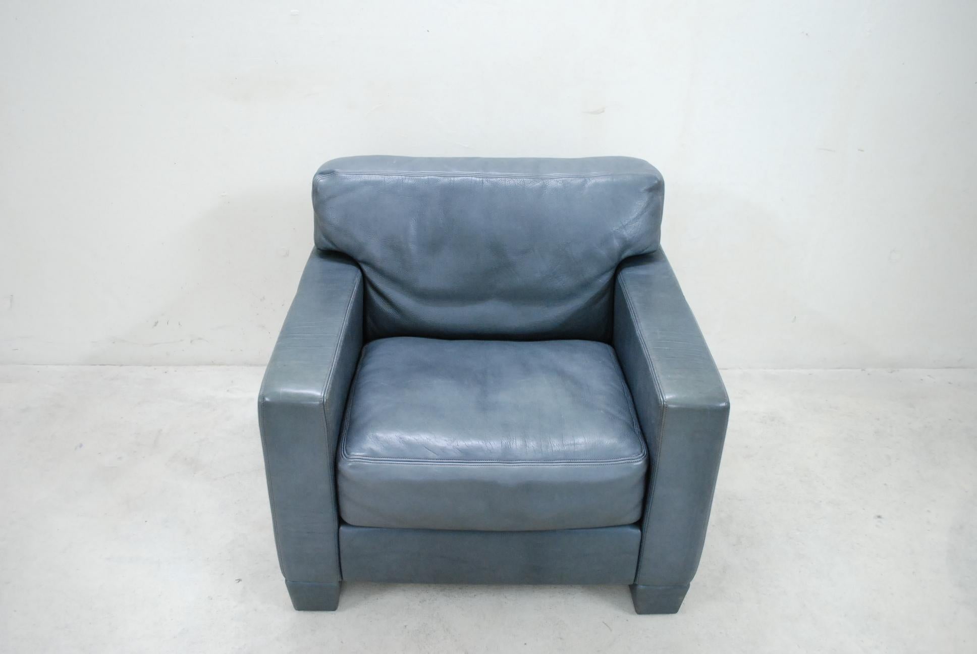 grey leather armchair
