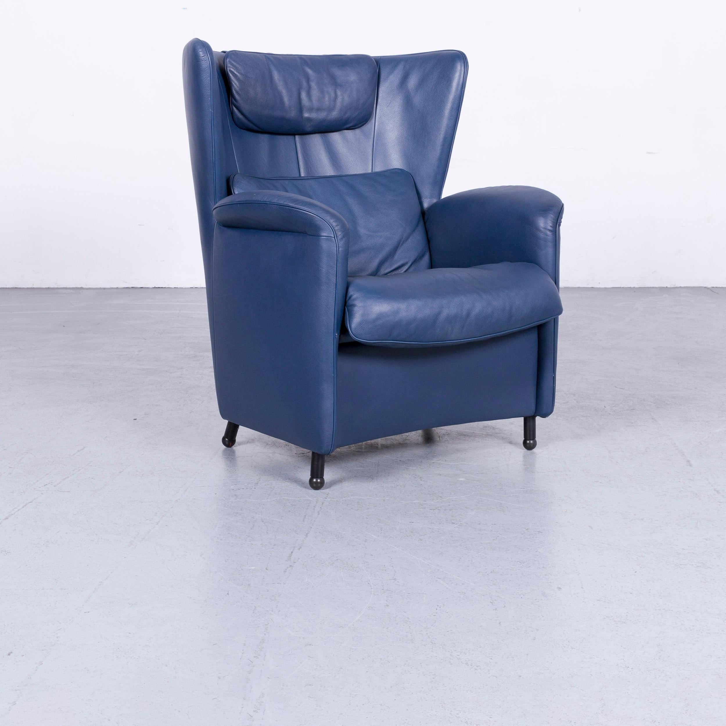 We bring to you a De Sede DS 23 leather armchair blue one-seat set with footstool.

















  