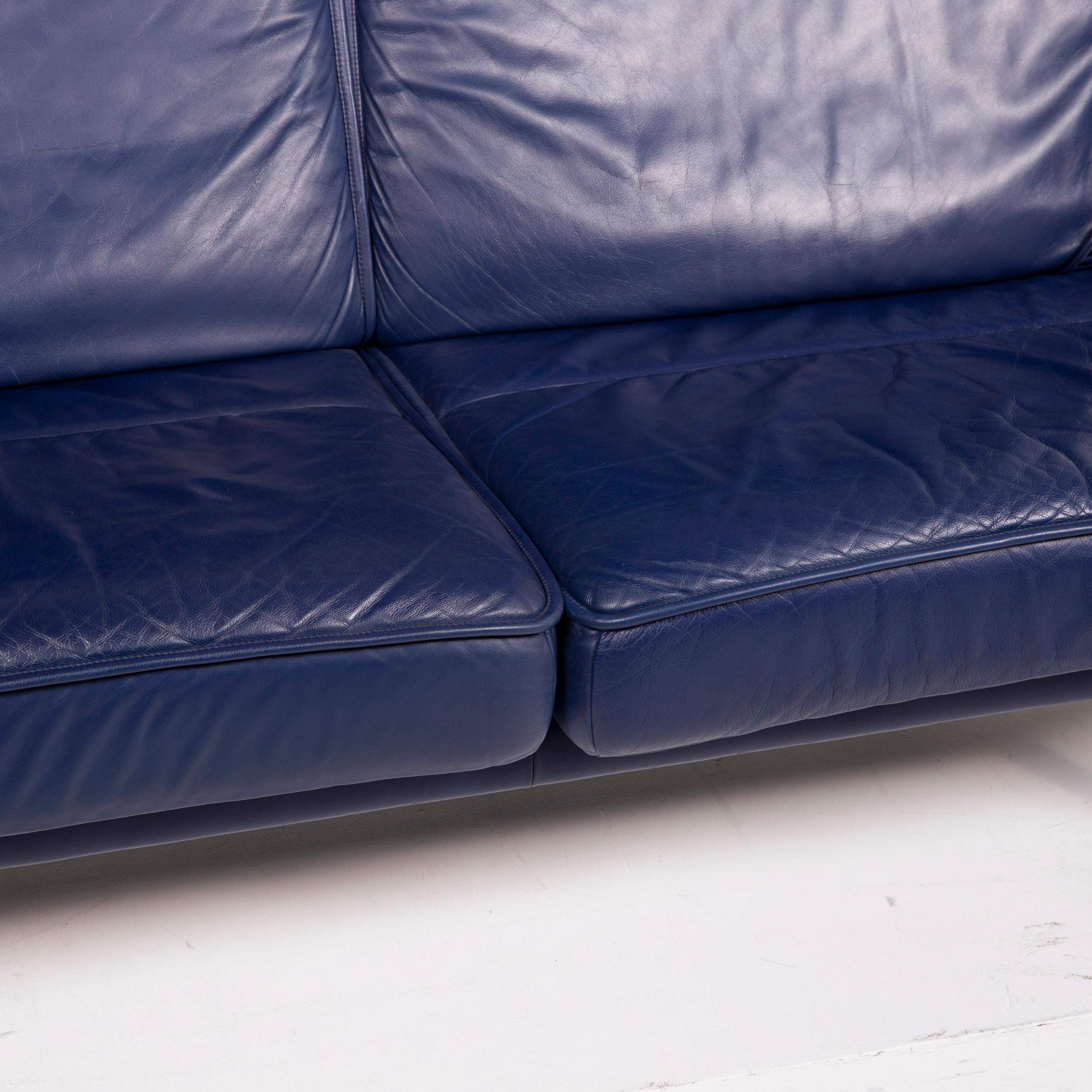 blue leather two seater sofa