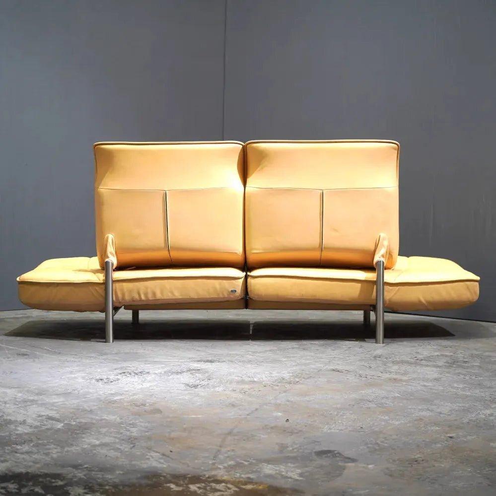 This leather sofa by De Sede combines comfort with contemporary design. The high-quality leather and sleek lines make it a stylish addition to any living space. Perfect for modern interiors, providing both luxury and functionality.

Additional