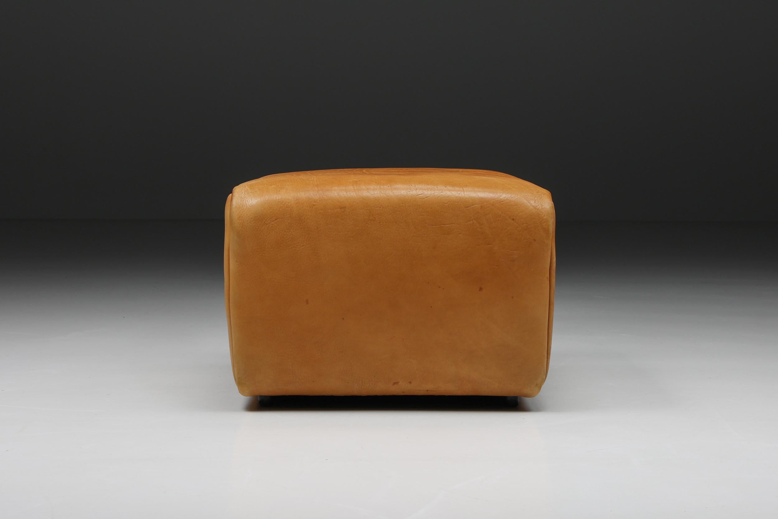 De Sede DS 47 cognac leather ottoman, stool, Swiss design, 1970's.

Cognac leather ottoman by Swiss manufacturer De Sede. The DS models are true design Classics and are still in production. This is an original ottoman with tons of character and a