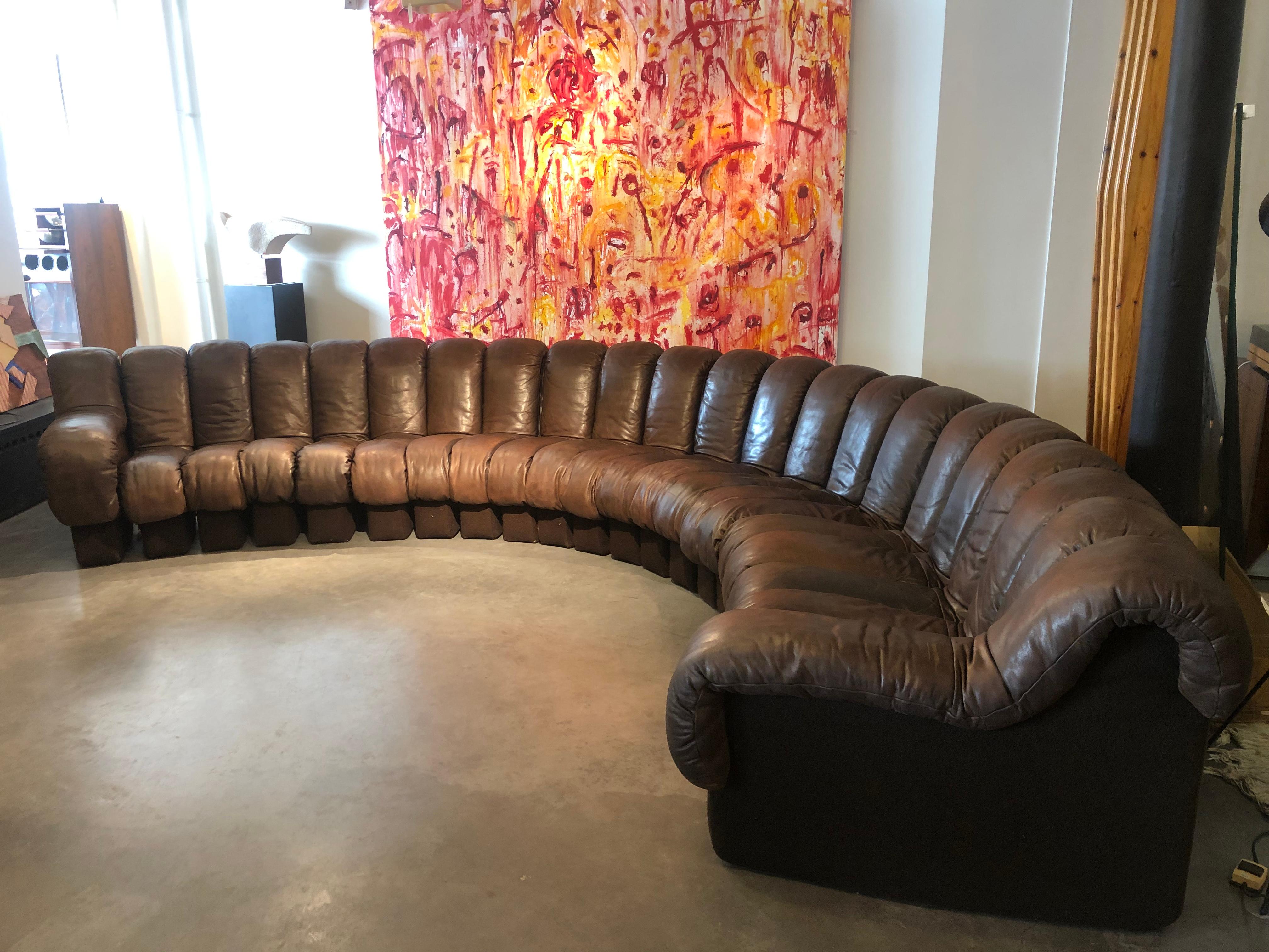 Very impressive sofa by de sede model ds 600 called « non stop sofa » with 22 elements in very good condition and with wonderful middle brown patina.