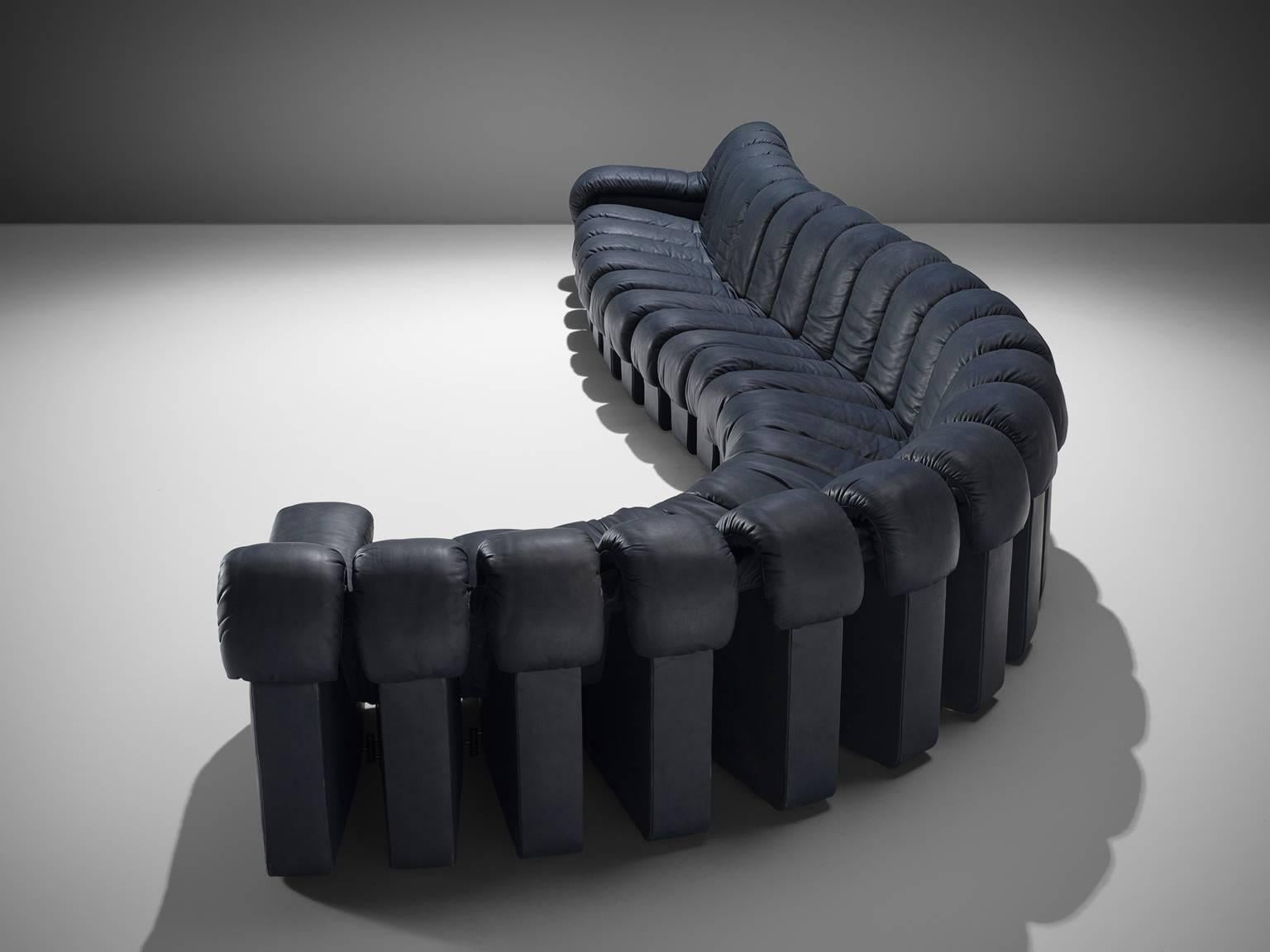 De Sede ‘Snake’ DS-600, 22 elements, navy blue leather, Switzerland, 1972. 

De Sede 'Non Stop' sectional sofa containing 22 pieces in original navy blue leather, of which two are higher armrests. Any number of pieces can be zipped together ensuring