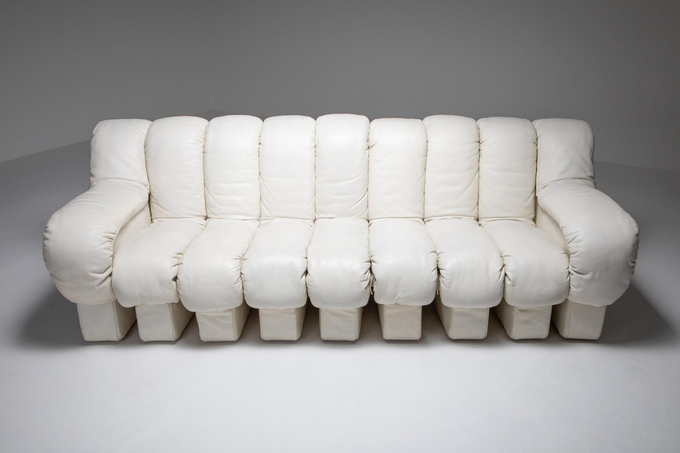 Sectional sofa by De Sede, Switzerland, 1970s

White leather three-seat couch 

Launched in 1972, DS-600 is an indestructible, variable modular system of upholstered furniture consisting of individual, addable armchair elements. These consist of