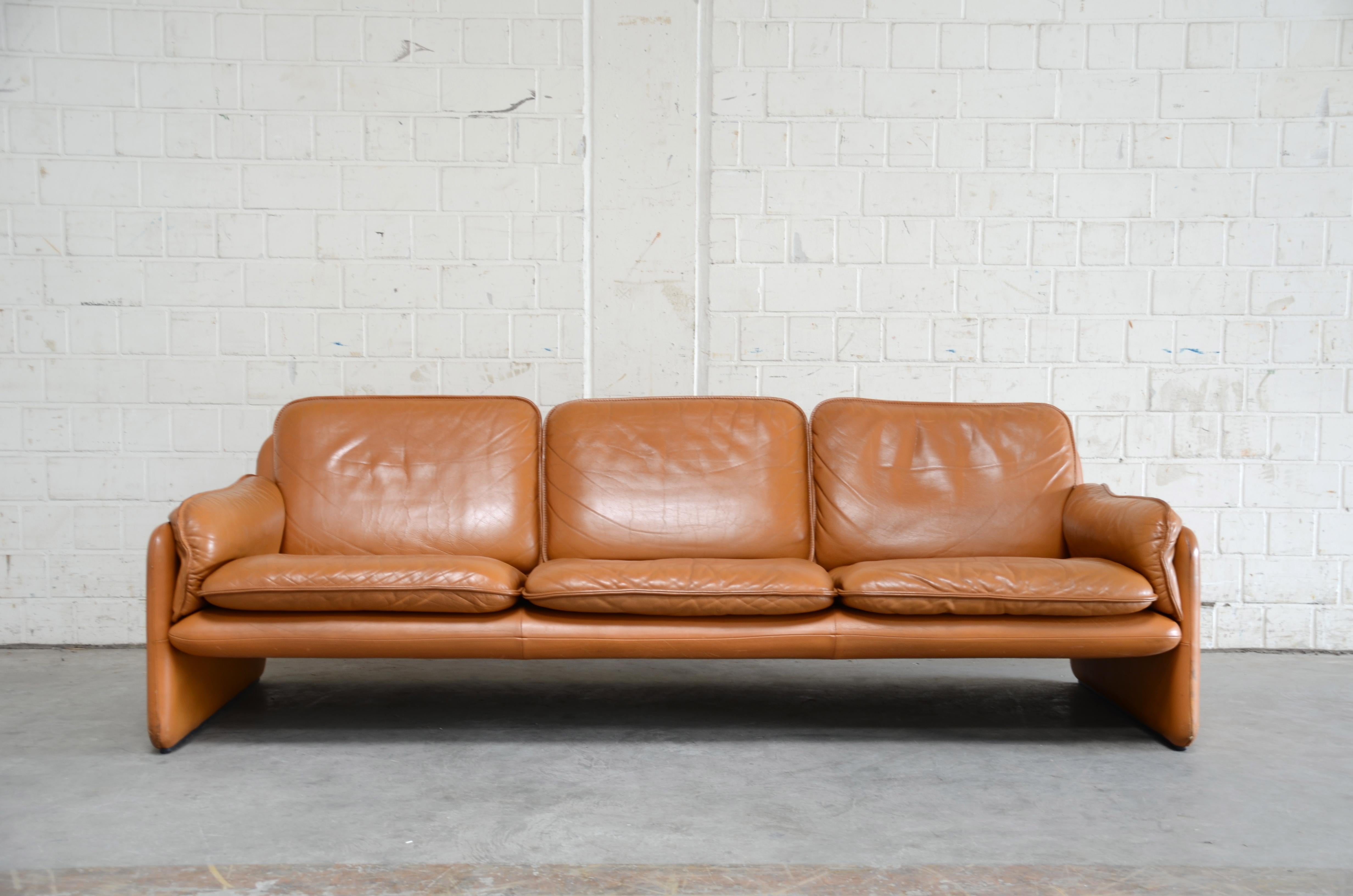 De Sede Ds 61 leather sofa in cognac color.
The leather surface has been refinished, 
The leather has been previously redyed.
De Sede is known for best leather craftman quality from Switzerland.
 