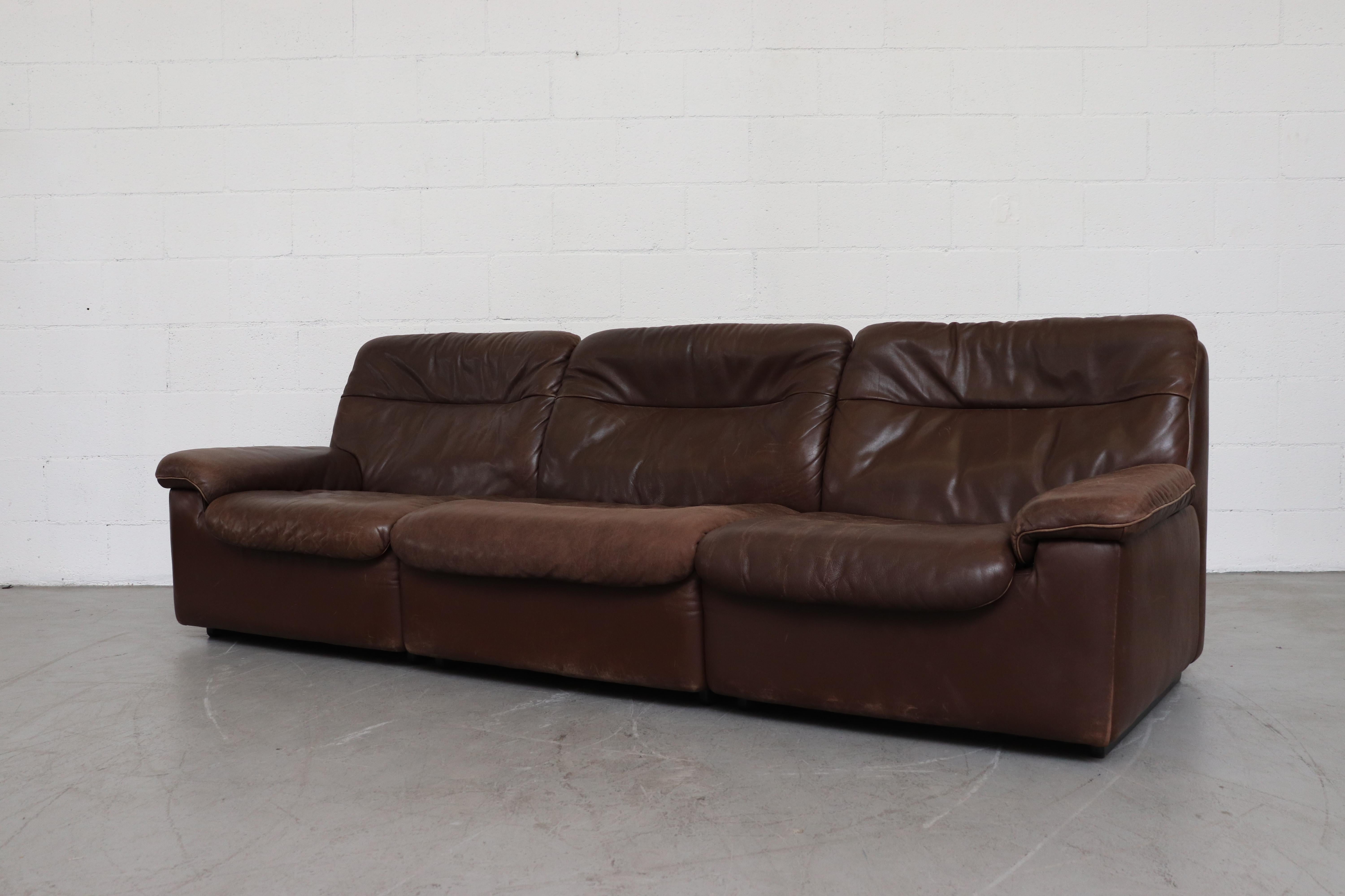 Thick chocolate brown leather 3-seat sofa in good original condition with nice patina and visible wear. A Matching Love Seat is also available and listed separately (LU922412766932)