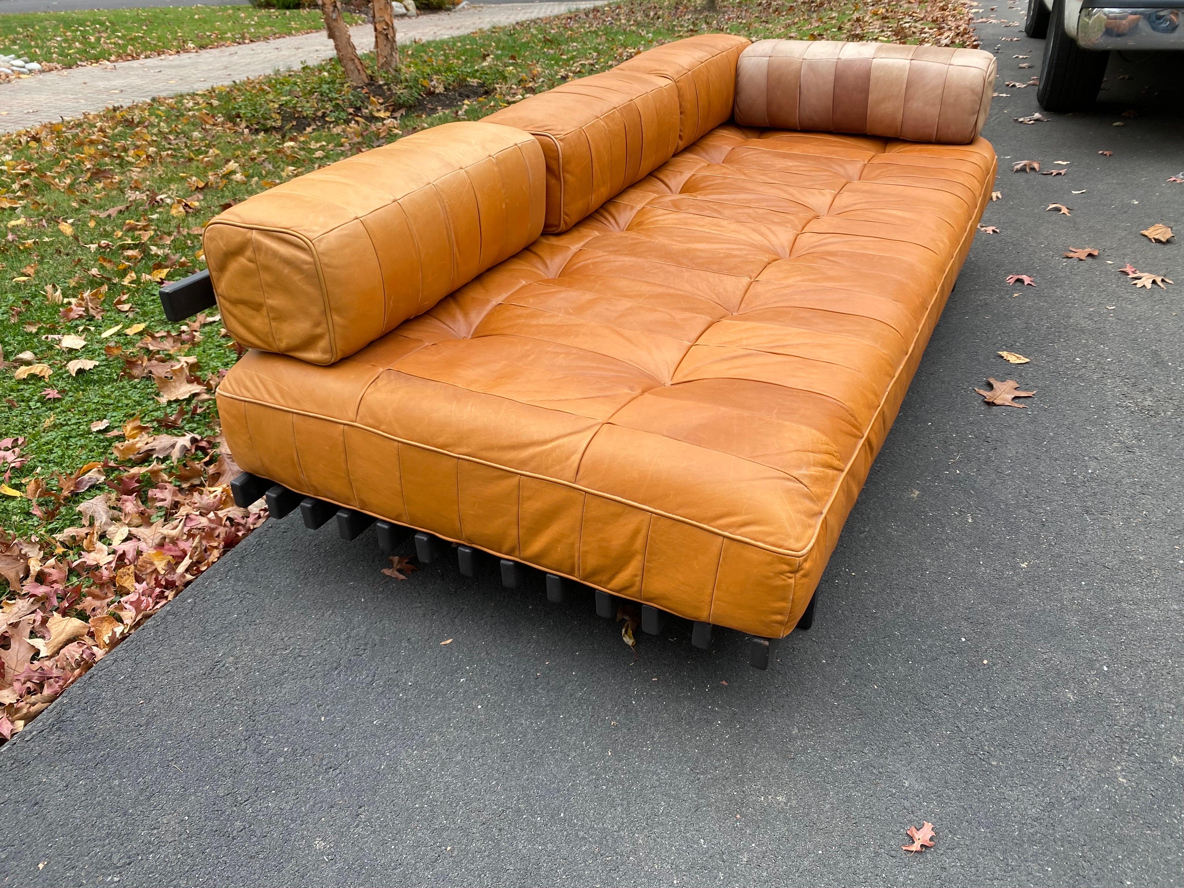 De Sede DS-80 Leather and Wood Daybed.  Beautiful Patch Style leather Cushion and Bolsters.  Bolsters are laced closed with leather.  Daybed in very nice shape!  This was  used in a guest room so daybed is very nice and clean!  One Accent Bolster