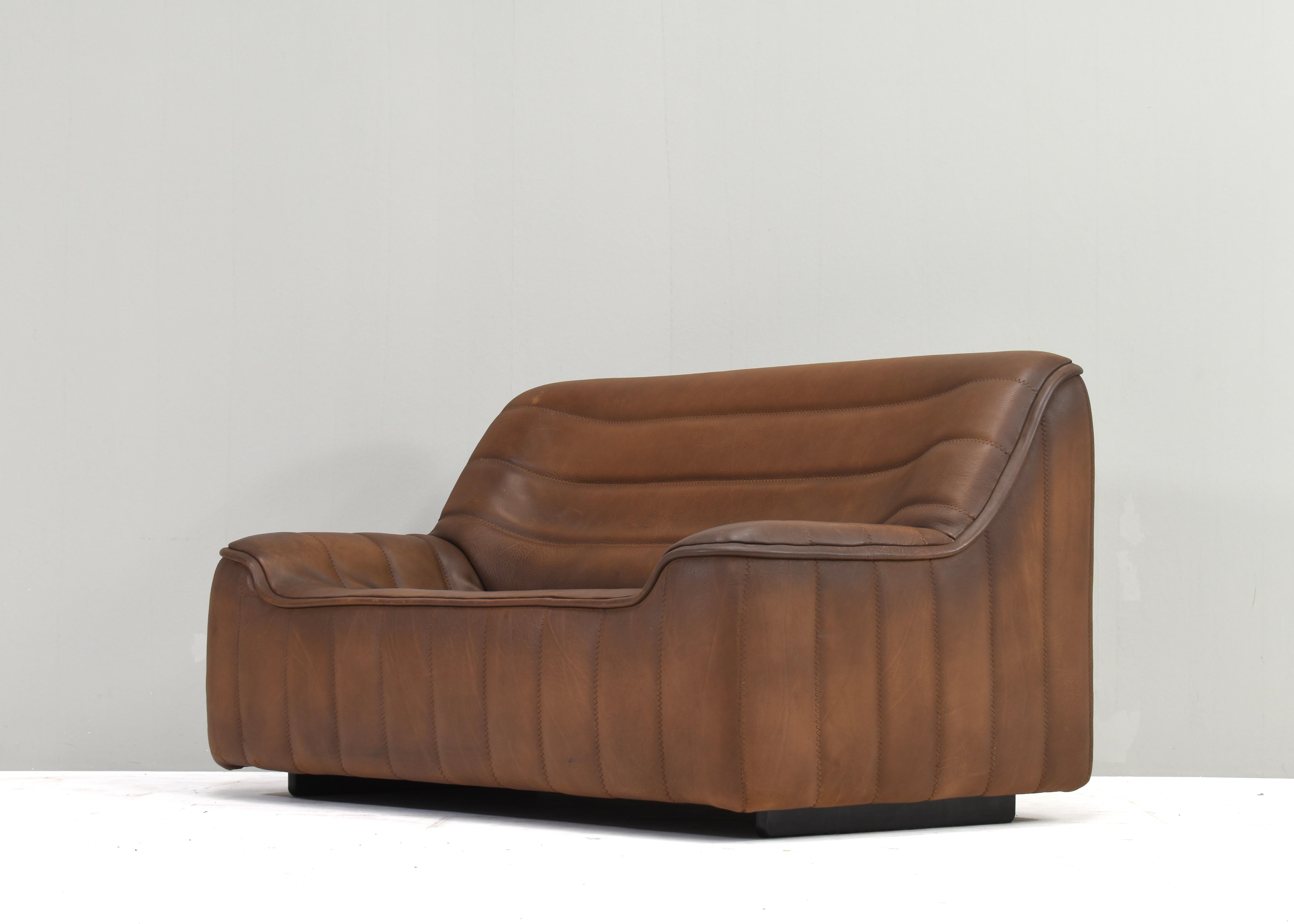 German De Sede DS-84 two seat sofa in Tan Buffalo leather – Switzerland, circa 1970 For Sale