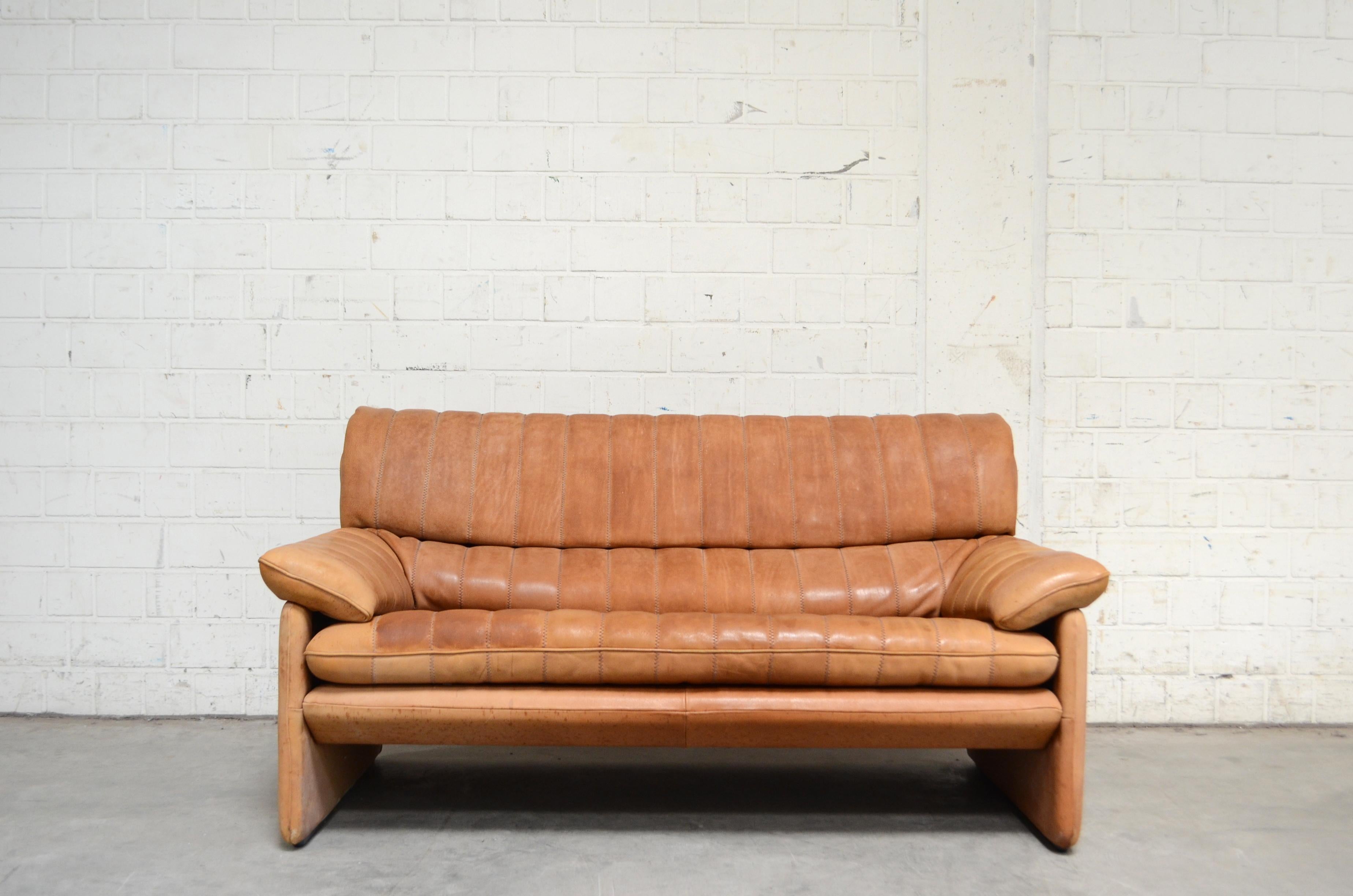 Vintage leather 2-seat sofa by De Sede.
Model Ds 86.
Thick neck leather with beautiful cognac color.
Great comfort.
With patina.
De Sede is a Switzerland furniture company that creates leather furniture with premium quality.
We also have a