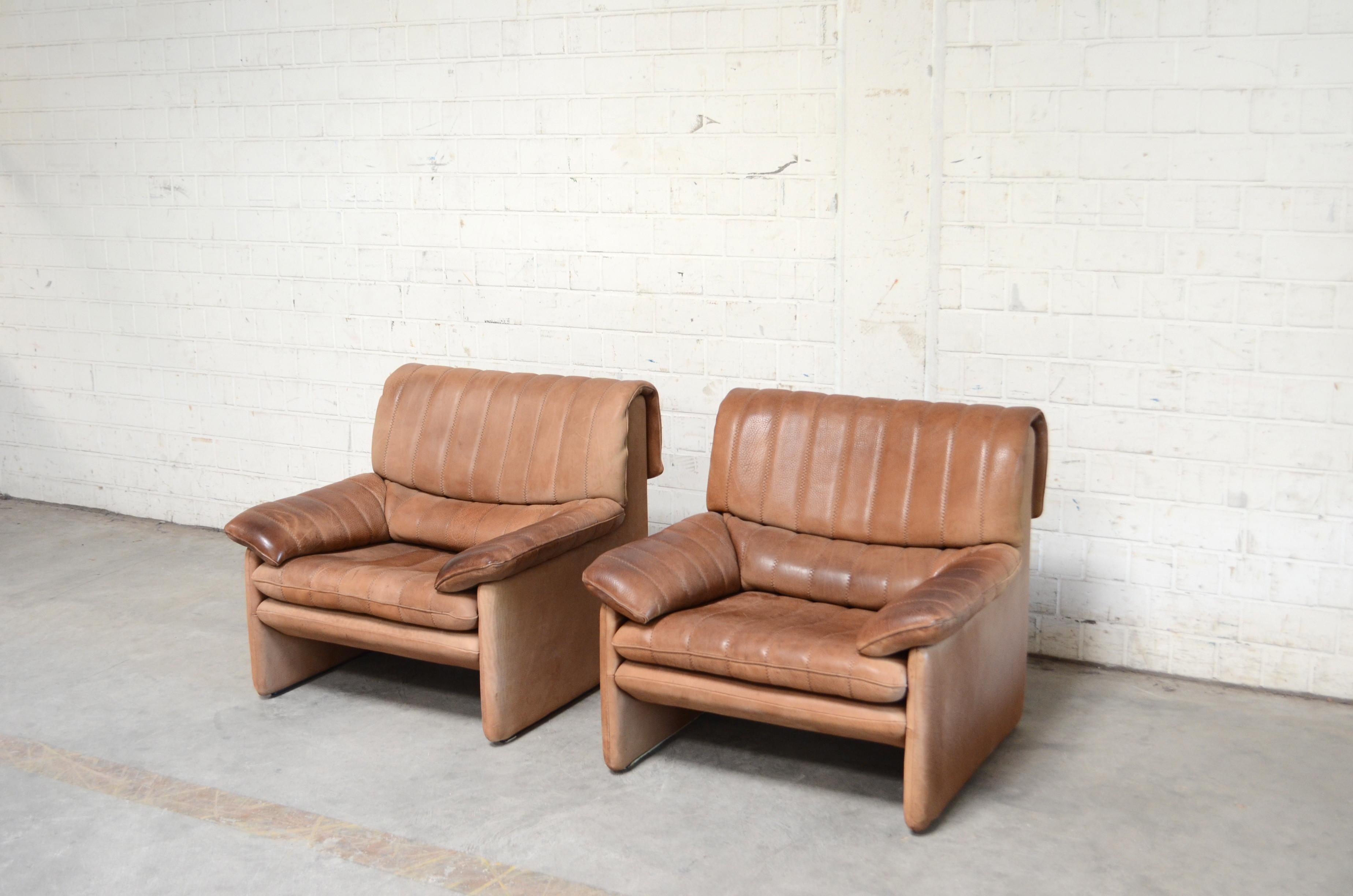 Vintage leather armchair by De Sede. Set of 2
Model Ds 86.
Thick neck leather with bright nature brown color.
Great comfort.
With patina on the armrests.
De Sede is a Switzerland furniture company that creates leather furniture with premium