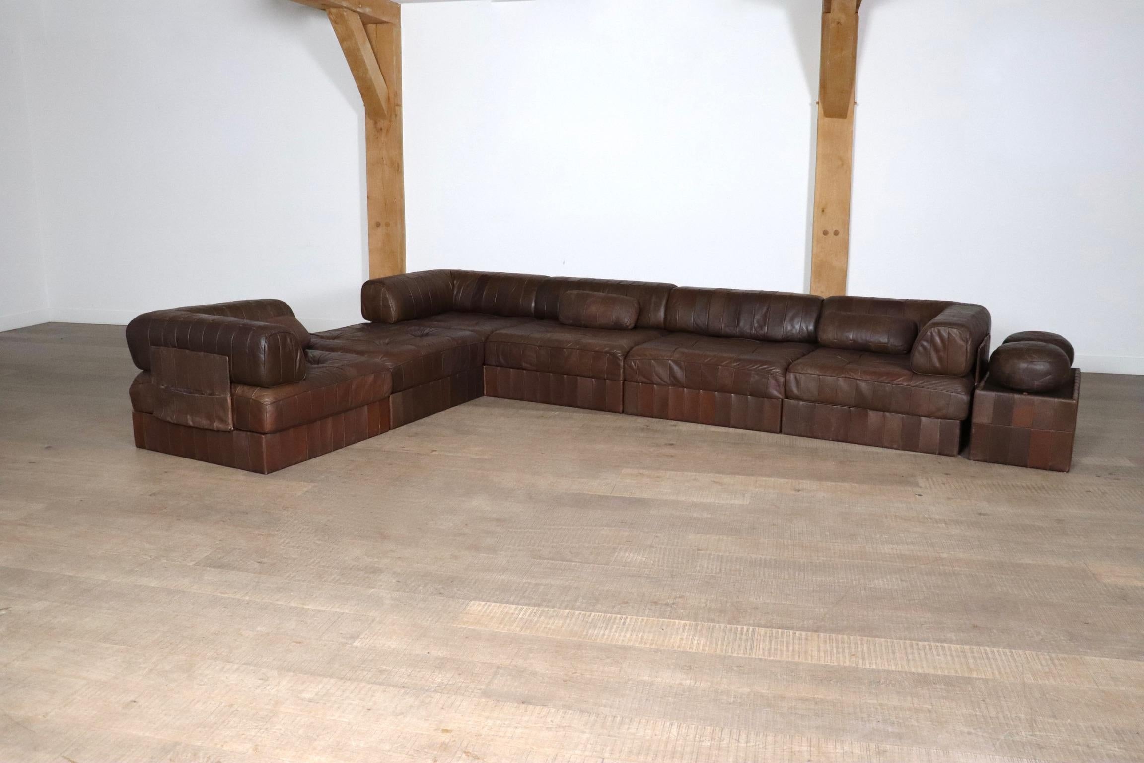 Fantastic DS-88 patchwork leather sofa designed and manufactured by De Sede, Switzerland 1970s.

The sofa consists of six elements, of which three corners, each with a brown leather patchwork base, seating cushion and back cushion made from the same